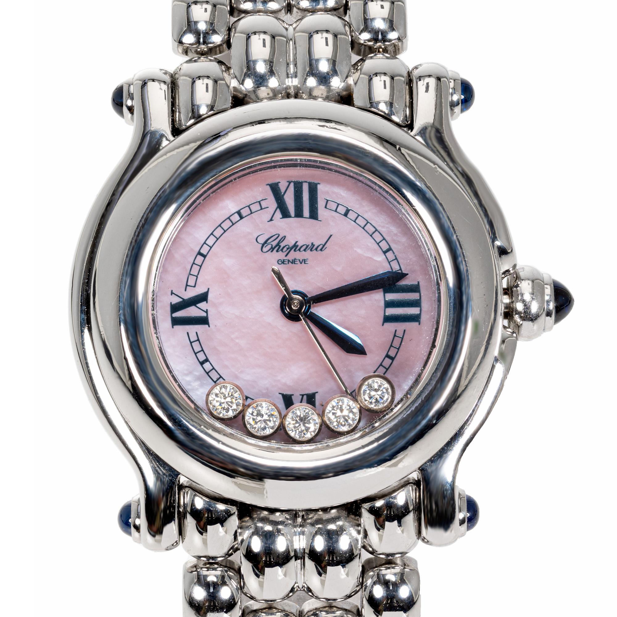 Iconic and Beautiful Ladies Chopard Happy Diamond Steel Quartz wristwatch with pink mother of pearl dial, with 5 round cut bezel set diamonds. Stainless steel bracelet. Circa 1995

Length: 28mm
Width: 26mm
Band width at case: 14mm
Case thickness:
