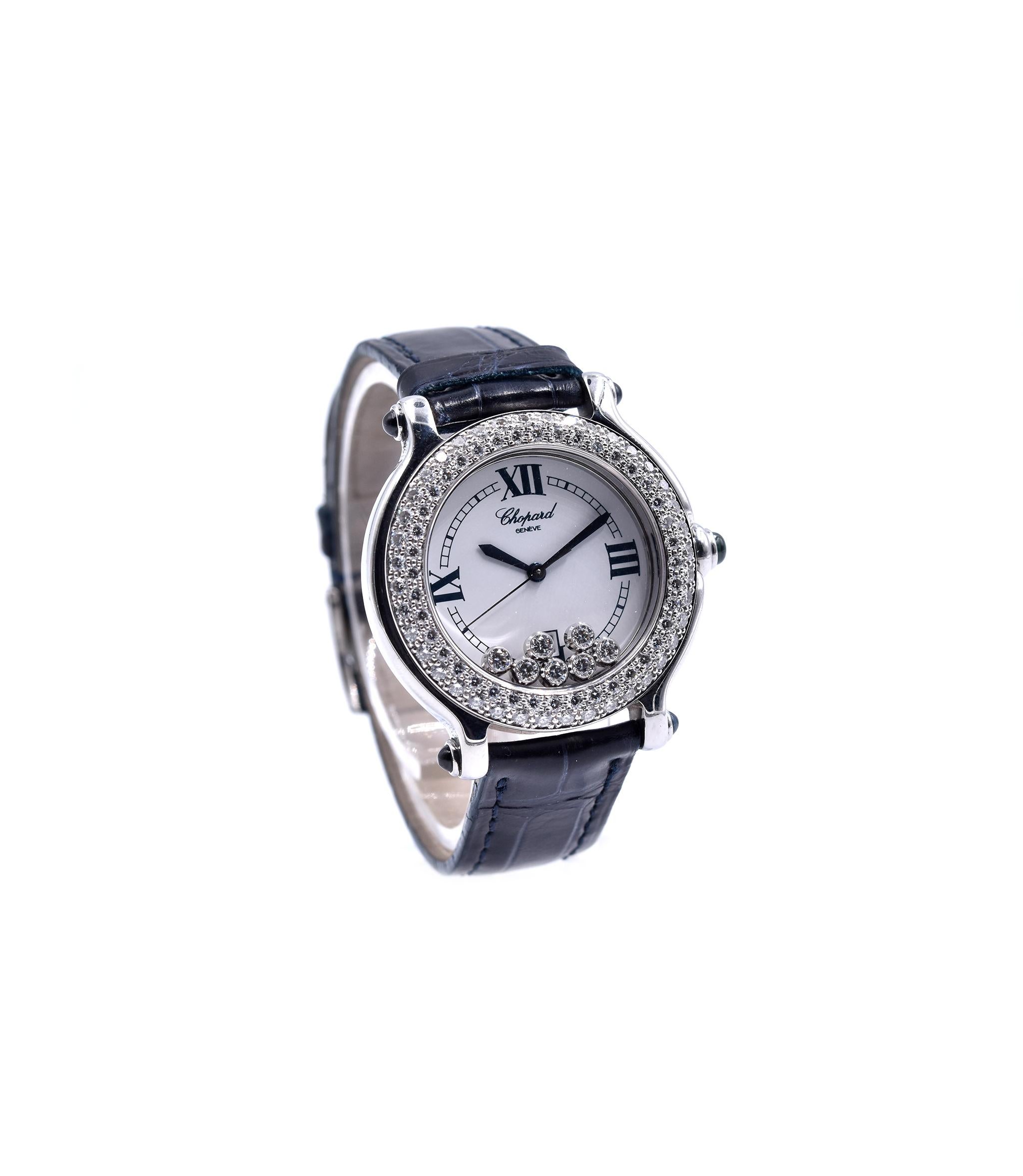 Movement: quartz
Function: hours, minutes, seconds, date
Case: 36mm case, push/pull crown, sapphire crystal
Band: Chopard black leather strap with buckle 
Dial: white roman and stick dial, luminescence hands
Reference #: 8236
Serial: 1067XXX

No box