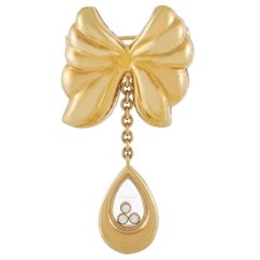 Chopard Broche vintage Happy Diamond en or jaune 18 carats et diamants