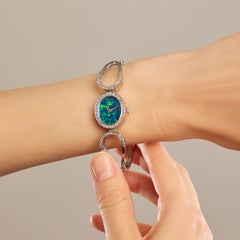 CHOPARD - Vintage watch in 18K white gold, opal, and diamonds