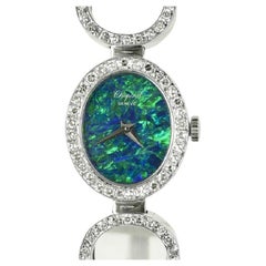CHOPARD - Montre vintage en or blanc 18 carats, opale et diamants