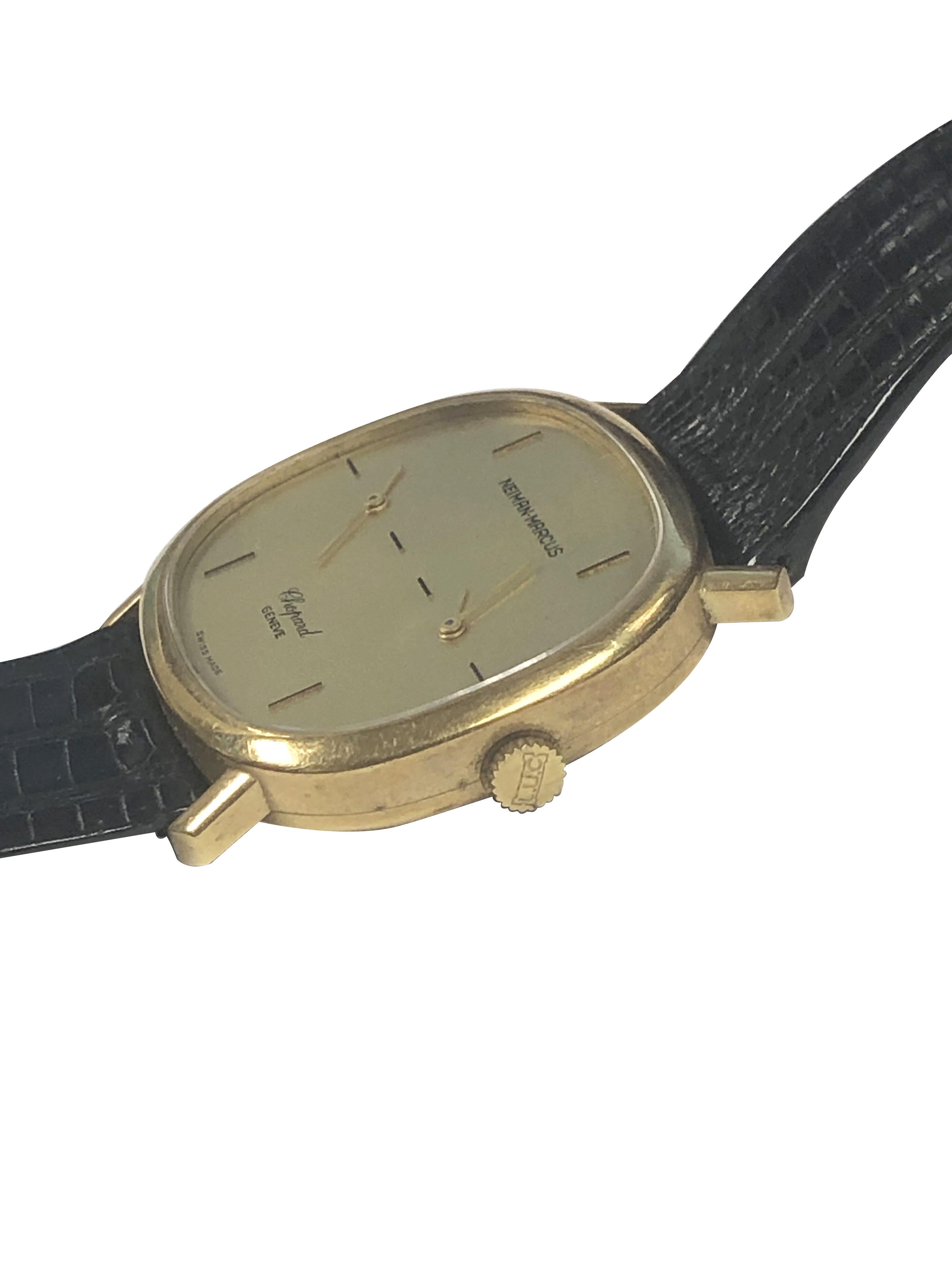 Circa 1980 Chopard, retailed by Neiman Marcus, Duel Time Zone Wrist Watch, 33 X 29 M.M. 18K Yellow Gold 2 piece case, 2 17 jewel mechanical, manual wind movement, Gold dial with Gold hands. original period Lizard Strap with Gold plate Chopard