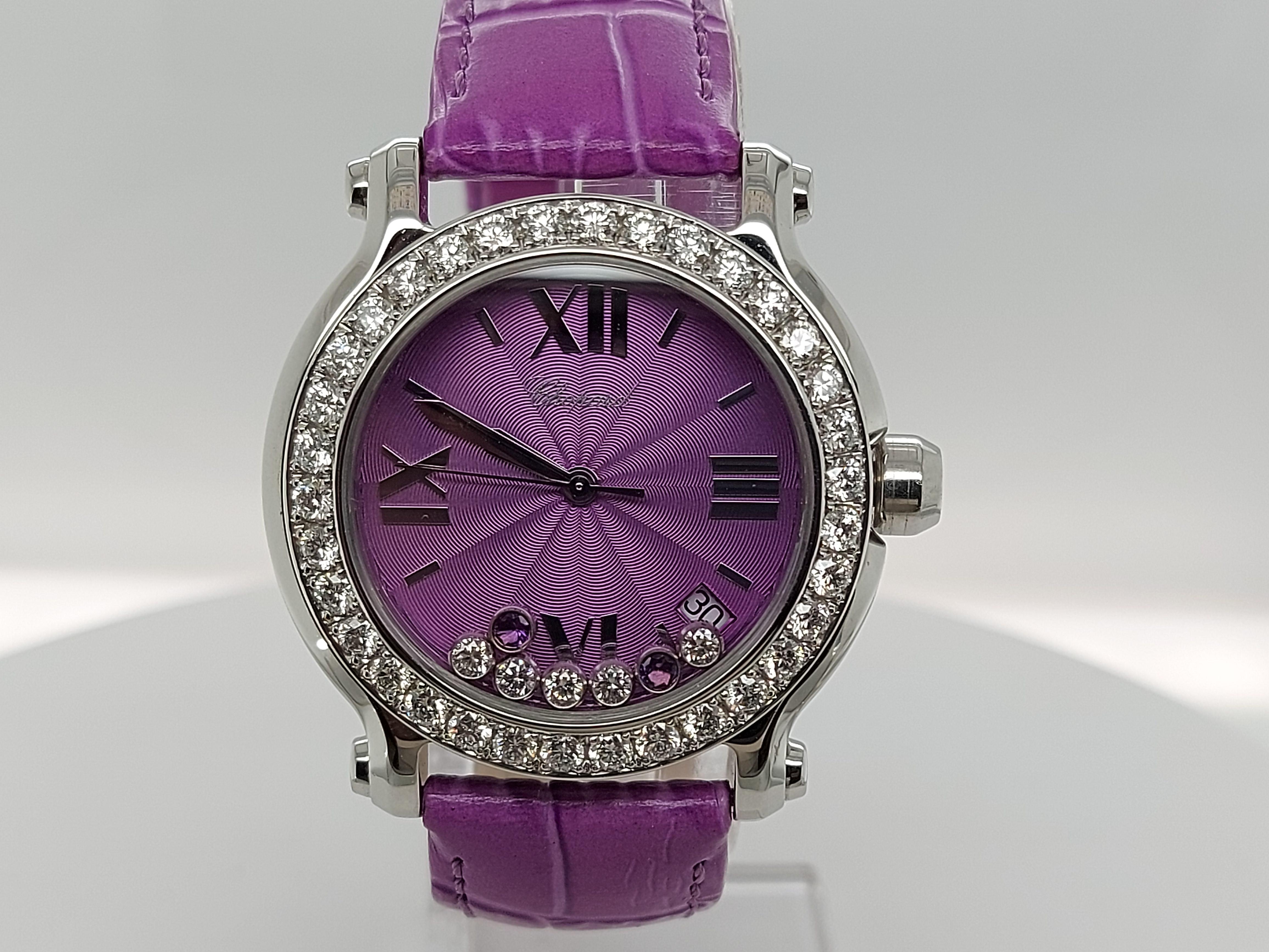 Beautiful and rare Chopard Happy Sport with floating diamonds and topazes .

Rare and collectable Chopard with Violet dial which was a special edition and very difficult to find !

Movement: quartz

Functions: hours, minutes, seconds, date

Dial: