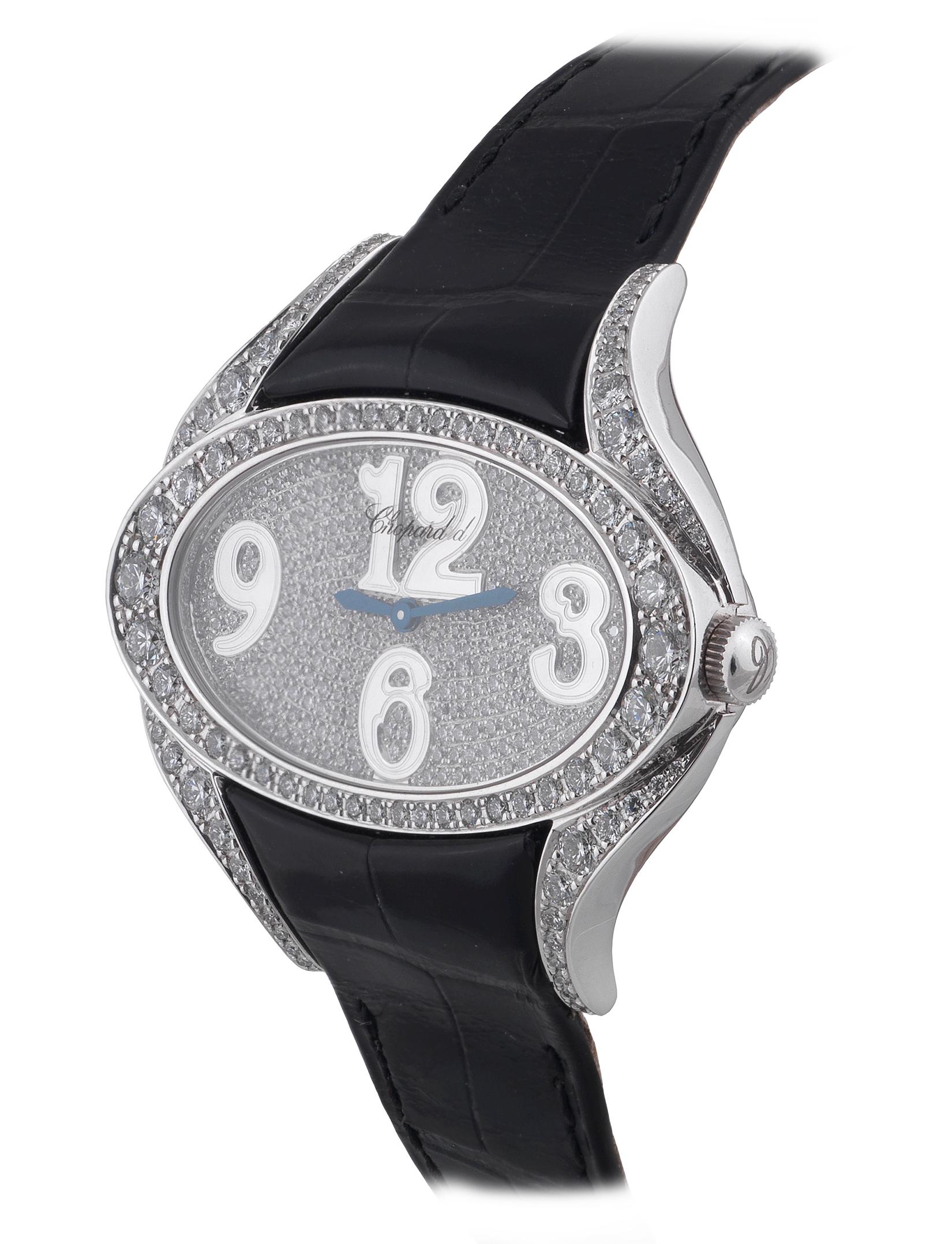 Case No. 600546 Very fine and elegant, 18K white gold & diamond, quartz wristwatch with an 18K white Chopard buckle set with 16 brilliant-cut diamonds . Accompanied by the fitted box and certificate. 
Two-body, polished, horizontal oval set with 96