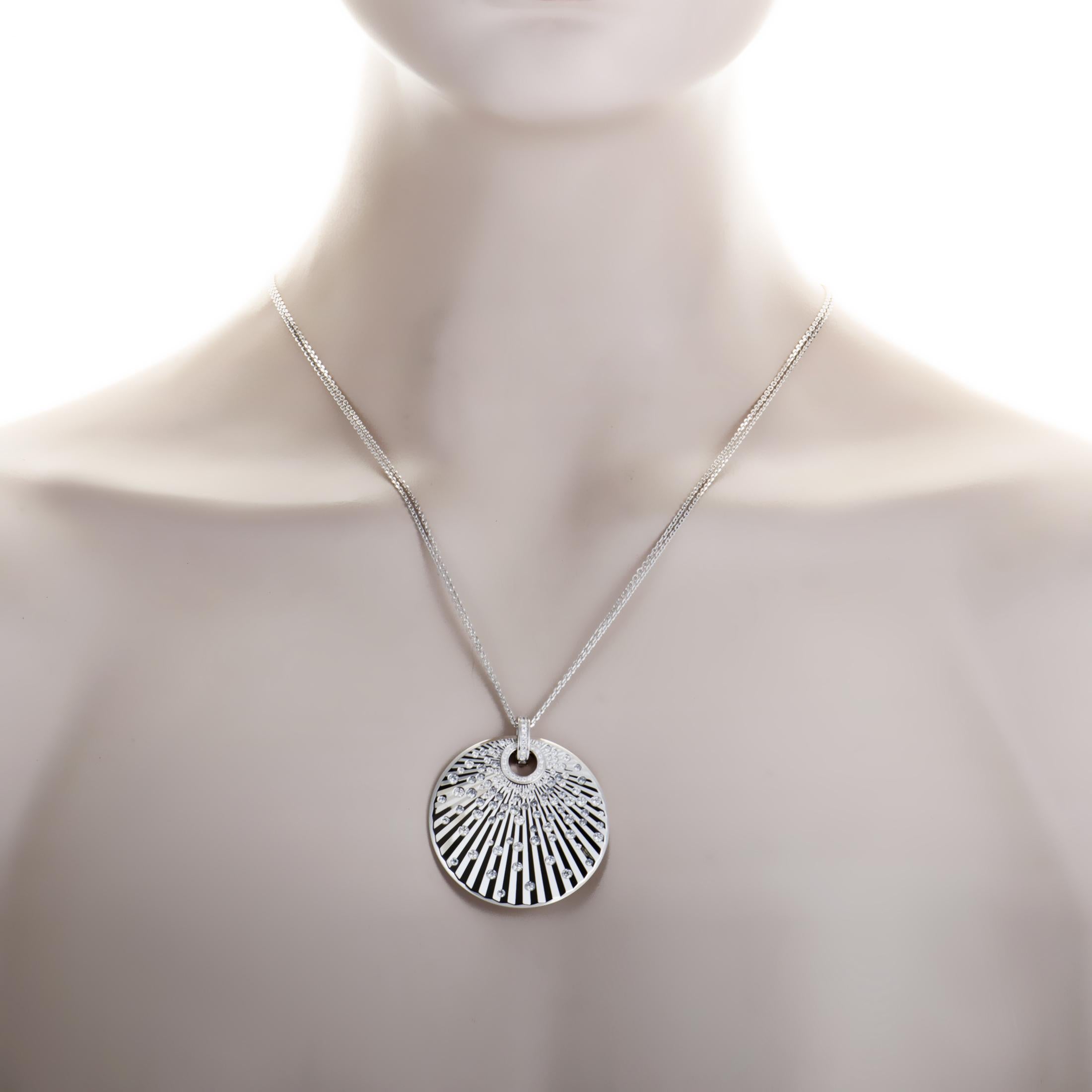 Producing an exceptionally mesmerizing allure with its intricately ornamented 18K white gold and fascinating arrangement of sparkling diamonds weighing in total 3.07 carats, the astonishing pendant of this fantastic necklace from Chopard is a