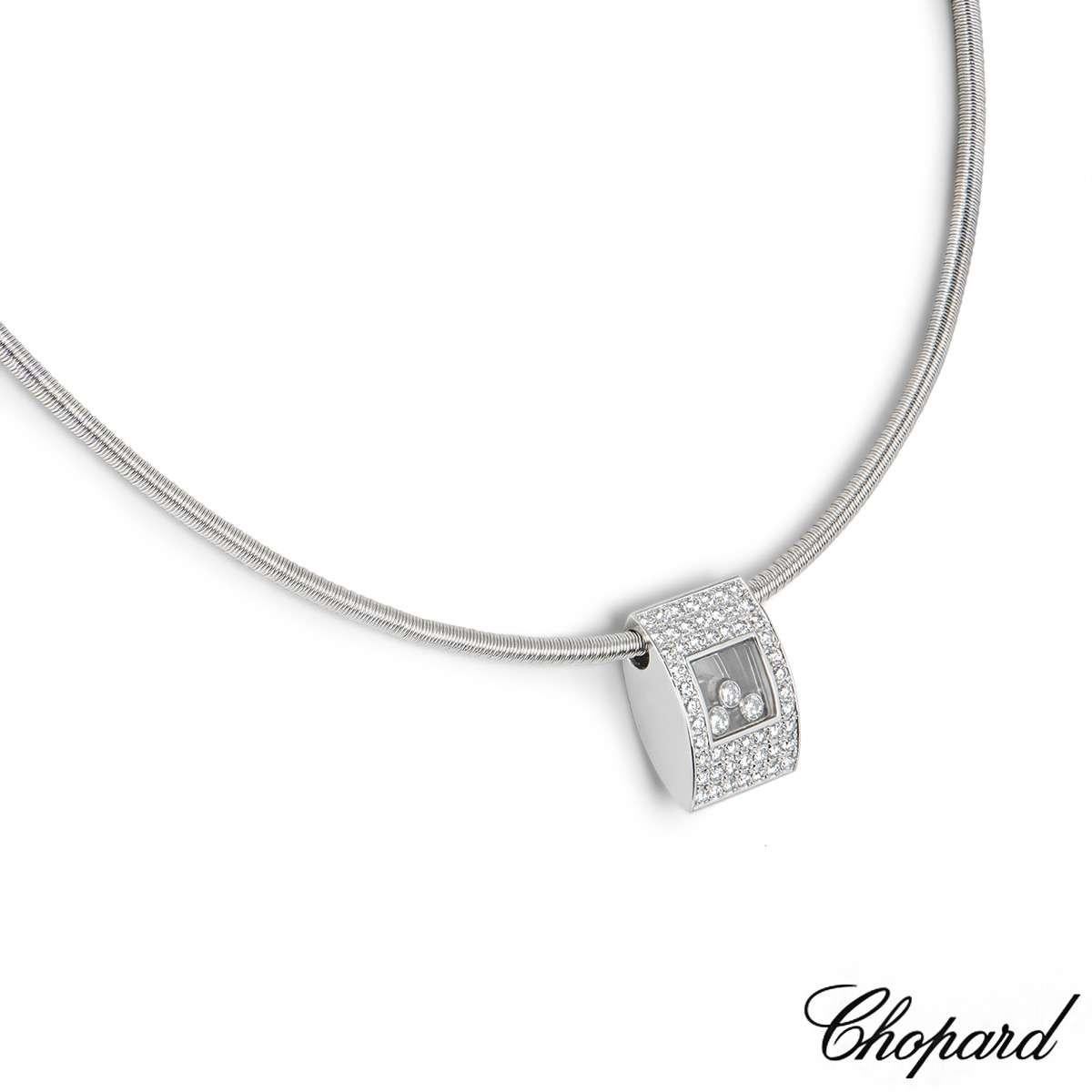 An 18k white gold necklace from the Happy Diamonds collection by Chopard. The necklace features a diamond set rectangular motif pave set with 52 round brilliant cut diamonds totalling approximately 1.04ct and 3 floating diamonds behind the Chopard