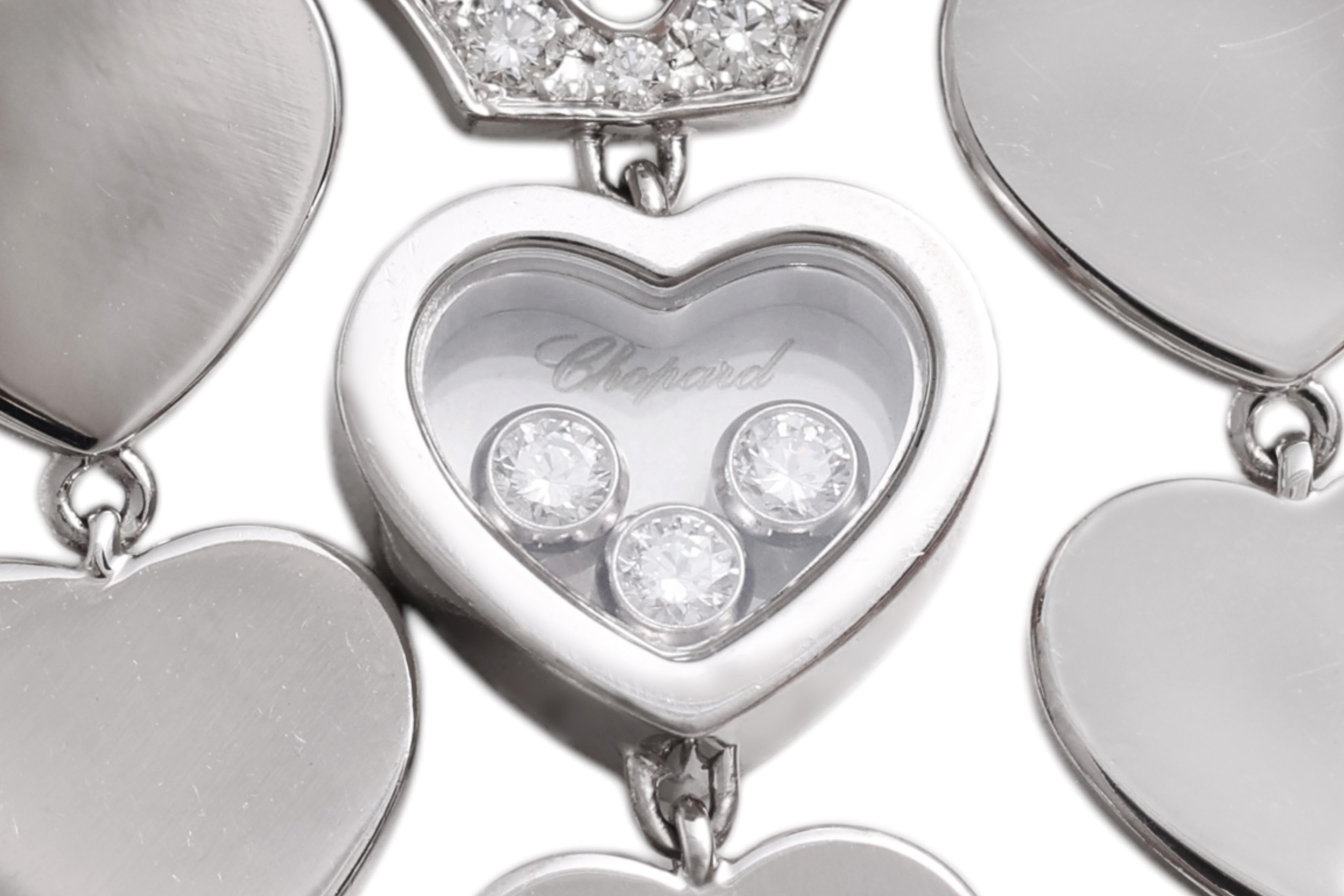 This pendant is part of the chopard Happy Amore pendant from the brand Chopard. 

Sassy yet classy, this Chopard Happy Amore pendant necklace is sure to turn heads! 
The necklace is made of 18K white gold and features a heart shaped pendant accented