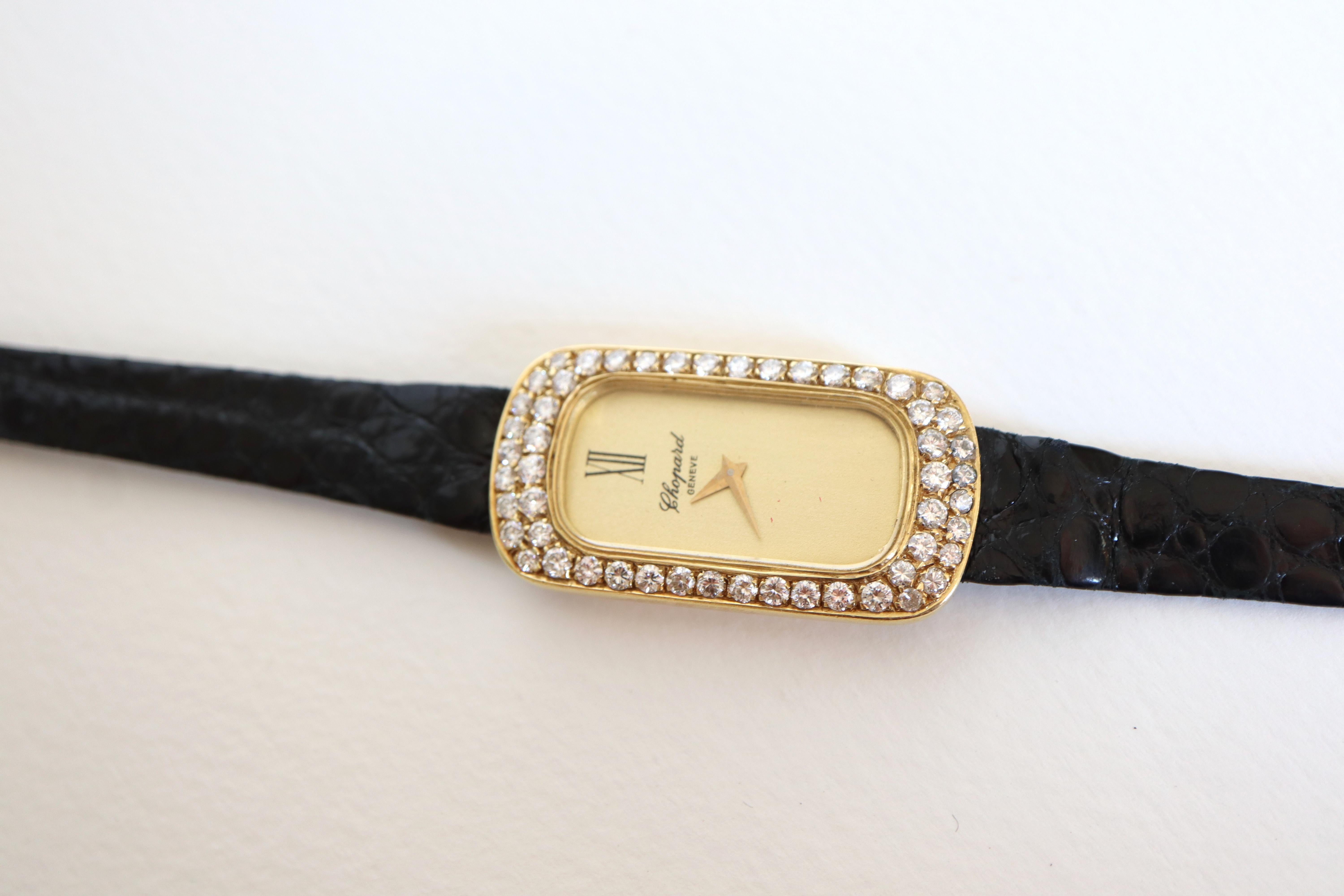 CHOPARD Lady's Watch Baignoire Model in 18-Carat Yellow Gold and Diamonds
Original leather bracelet signed Chopard Genève and original gold-plated clasp
The 18-carat yellow gold bezel is paved with 52 brilliant-cut diamonds for a total weight of