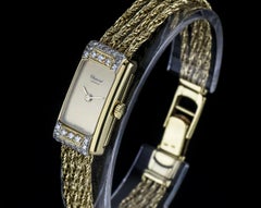 Chopard, cadran champagne vintage en or jaune avec lunette en diamants 5132