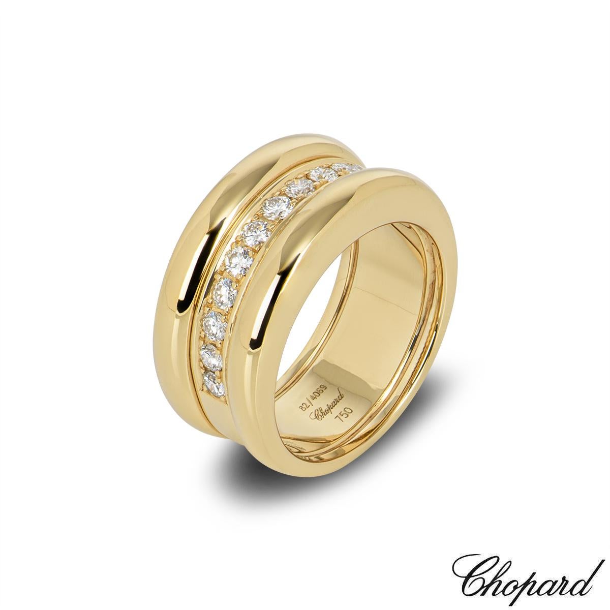 A classic 18k yellow gold diamond ring by Chopard from the La Strada collection. The ring is set to the centre with a row of 13 round brilliant cut diamonds with a total approximate weight of 0.50ct, complemented by a polished domed border set to