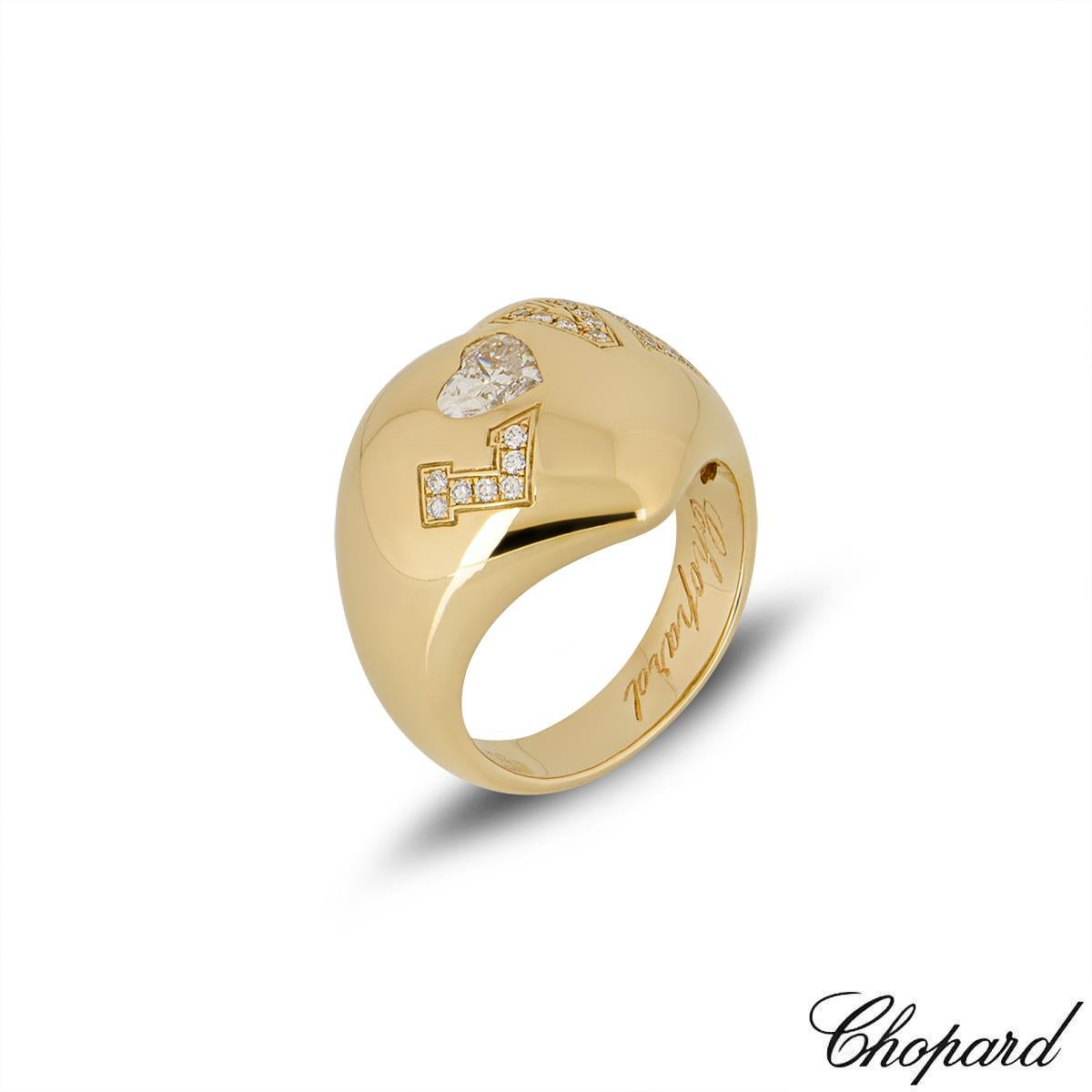 A Chopard 18k yellow gold diamond heart shape ring . 'Love' is spelt out in 23 pave set in diamonds totalling 0.16ct and a heart shape diamond totalling 0.52ct. The ring is currently a size UK N / EU 53 / US 6 1/2 but can be adjusted for the perfect