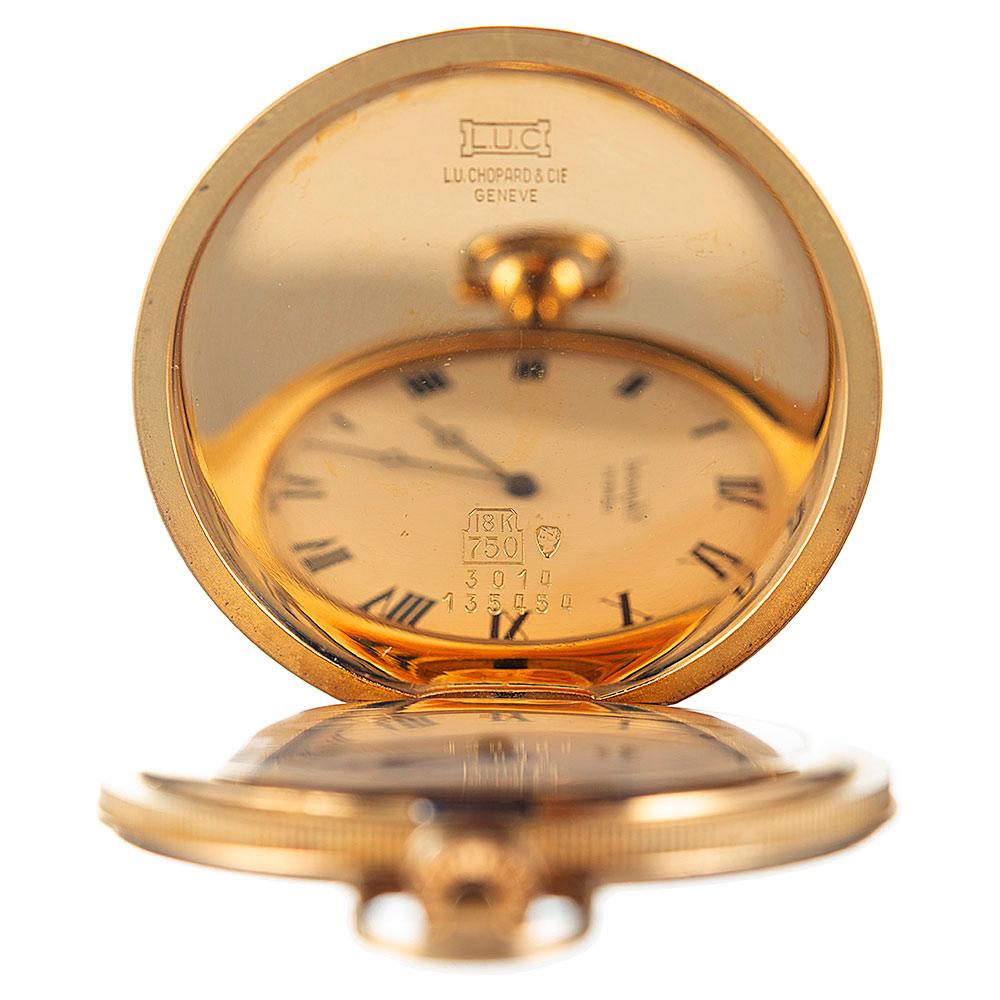 Classically-styled, yet boasting the robustness of modern manufacture, this golden pocket watch was created of 18 karat yellow gold by Chopard. Beautifully engraved and boasting a full compliment of hallmarks inside the case, the piece will make an
