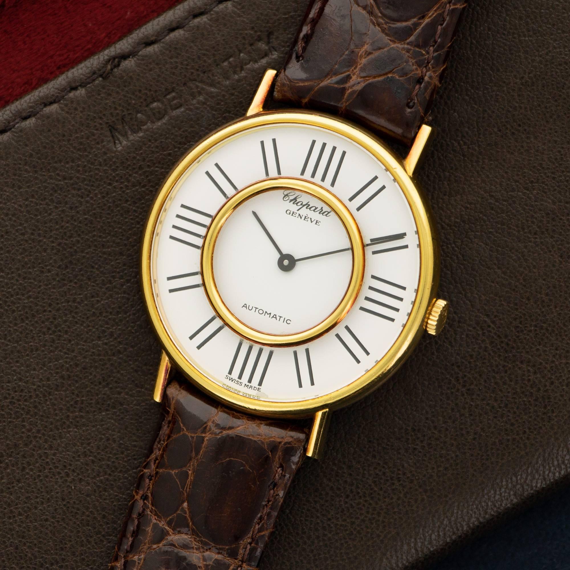 An Unusual 18k Yellow Gold Strap Watch by Chopard, Circa 1980's. 34mm Case Diameter. Automatic Movement. A Classic Shape with a Unique Dial. 