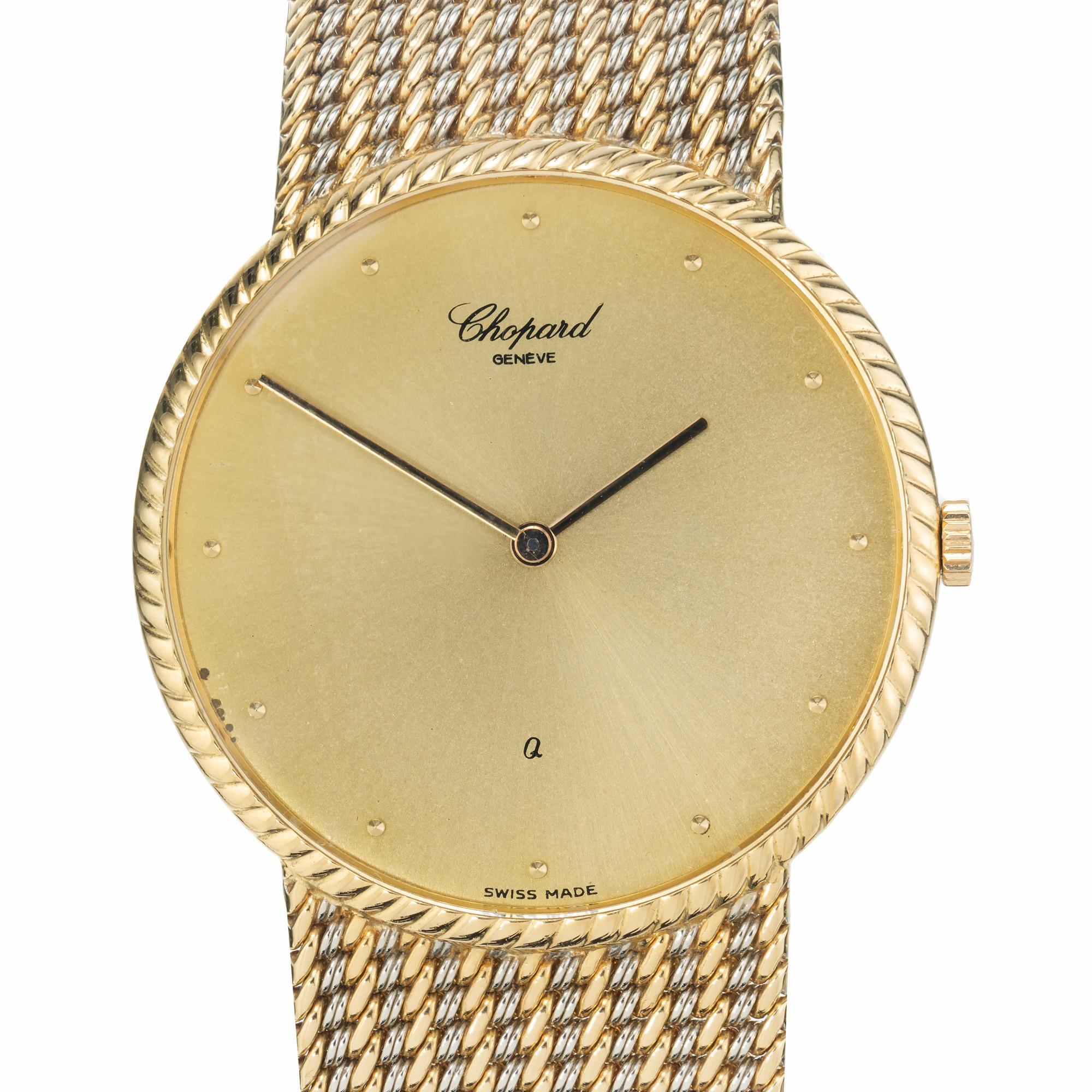 Chopard 18k yellow and white gold bracelet watch, circa 1980s. Chopard dress watch with a integral yellow and white gold woven mesh bracelet, quartz movement. 7.25 inches in length.

18k yellow and white gold
62.7 grams
Length: approx. 7 1/4