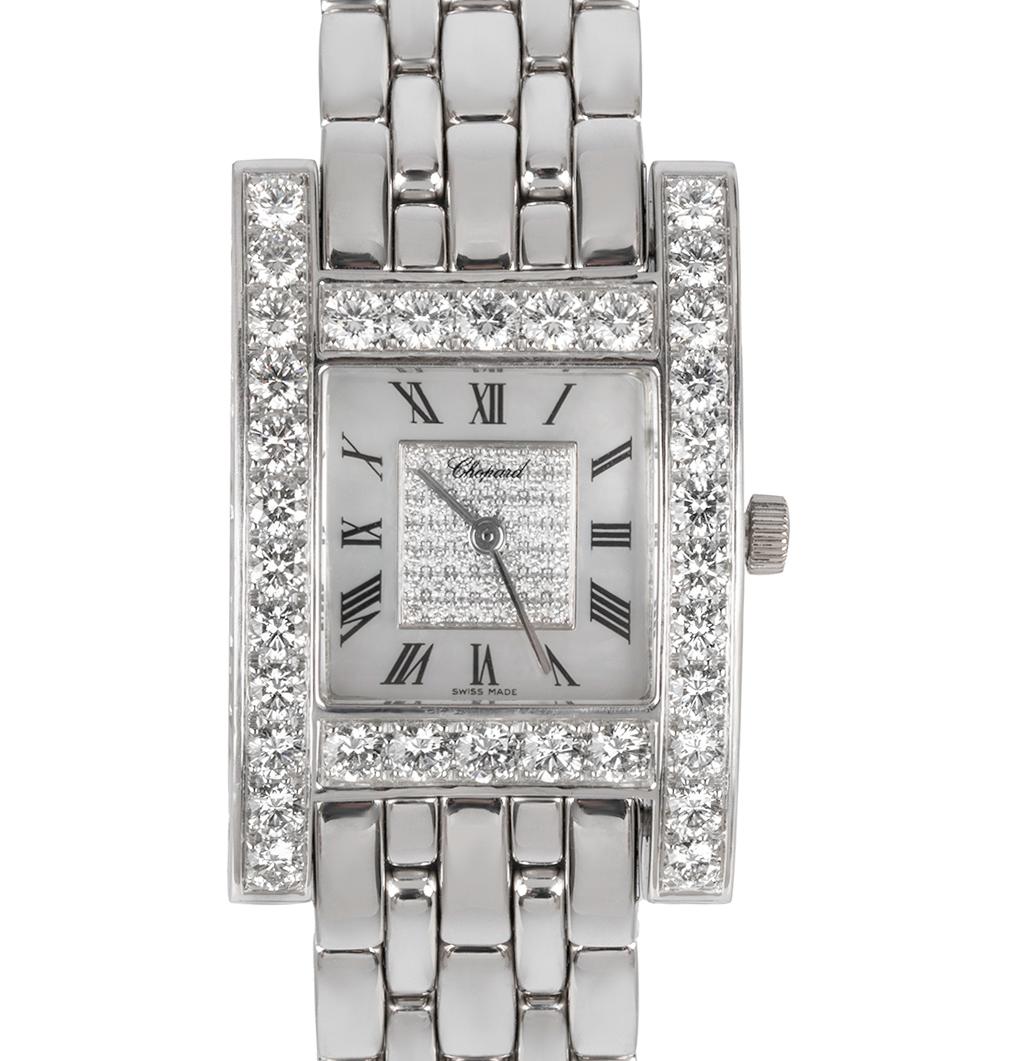 A 24mm 18k White Gold Your Hour Ladies Wristwatch, mother of pearl dial with a pave diamond square centre and roman numerals, a fixed 18k white gold bezel and 18k white gold lugs set with approximately 34 round brilliant cut diamonds (~2.72ct), an