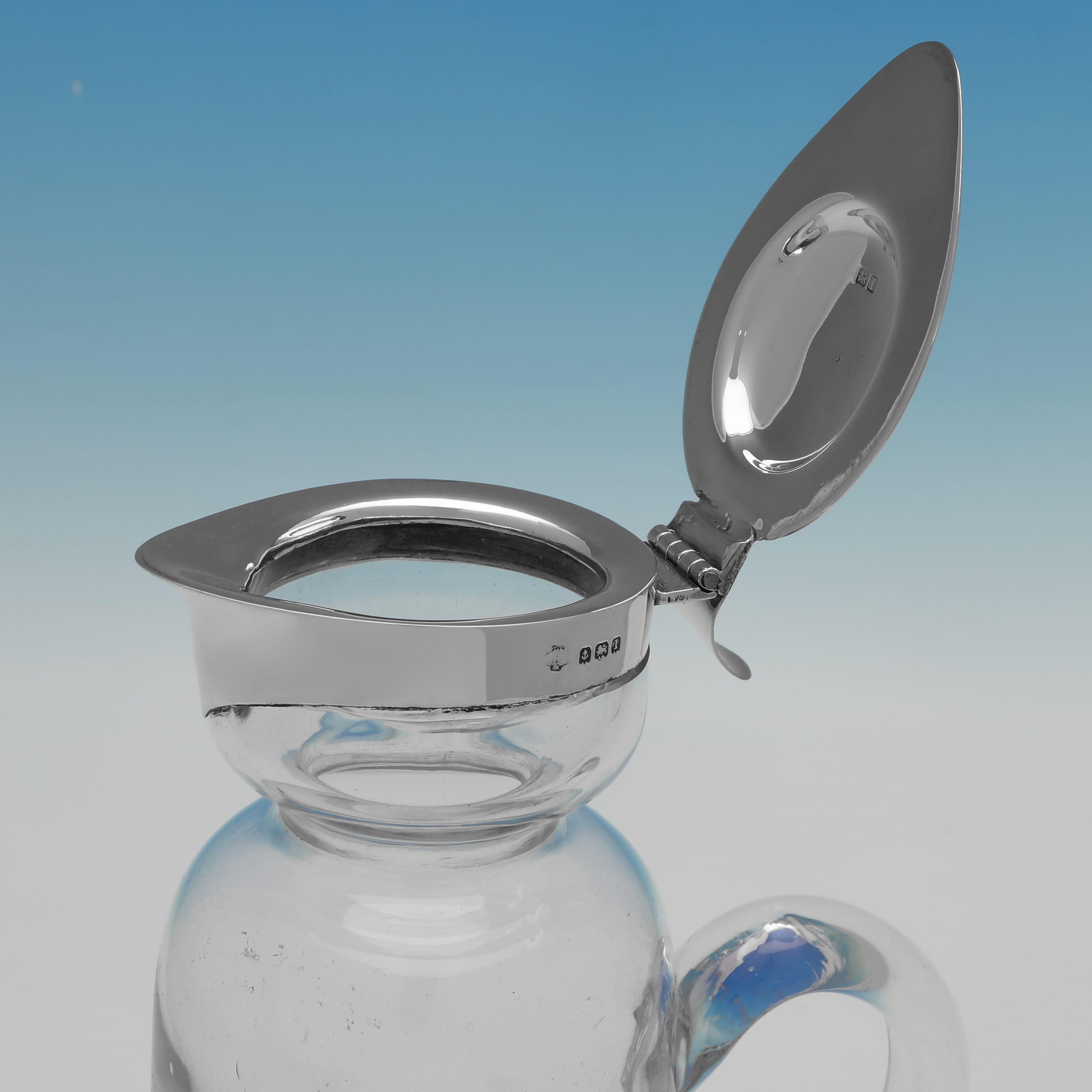 Jarra de clarete antigua de plata de ley y cristal con diseño 