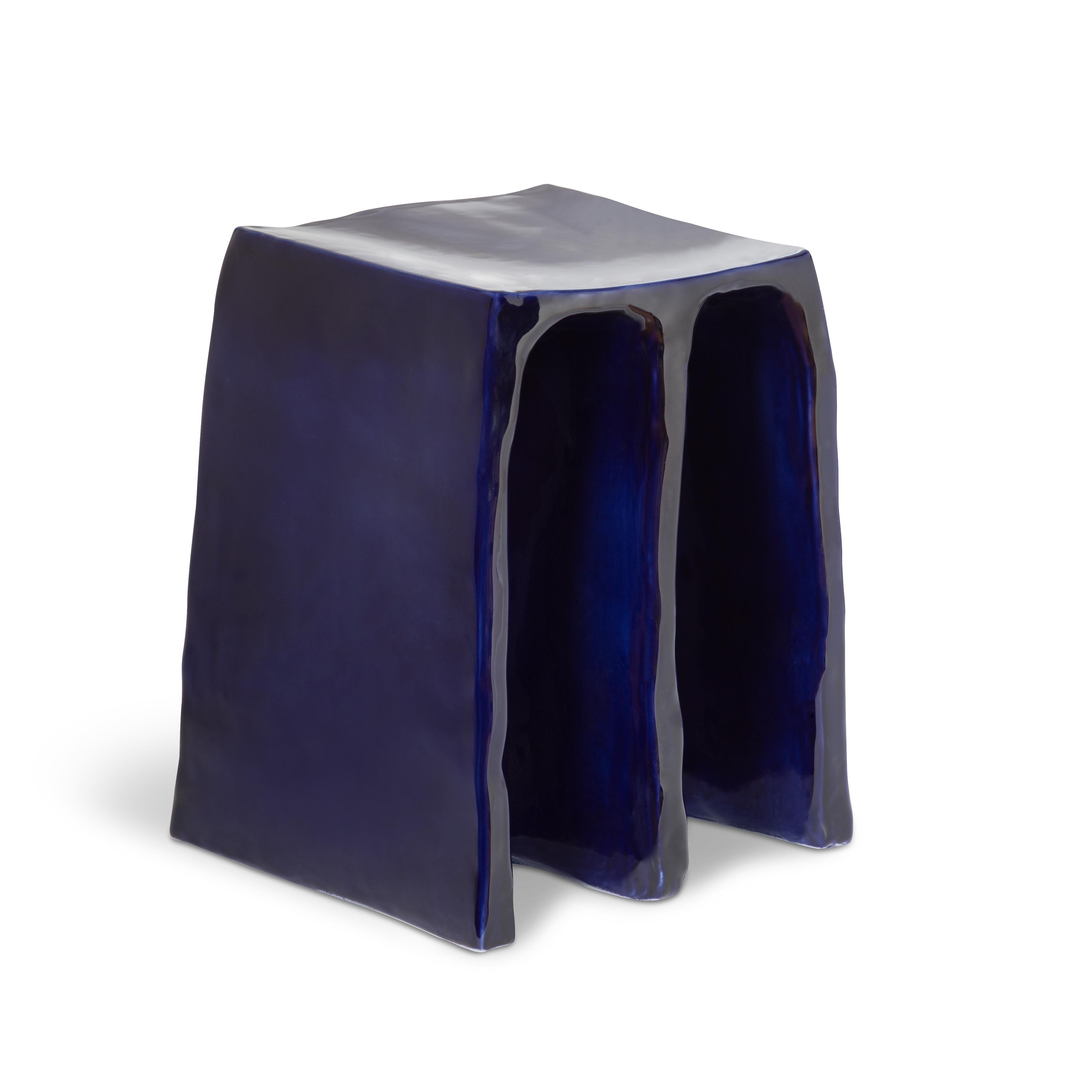 Chouchou cobalt stool by Pulpo.
Dimensions: D35 x W30 x H43 cm.
Materials: ceramic.

Also available in different colours. 

Whether stool or storage table, piece of column or inspired by the wrinkled folds of a curtain: in any case, chouchou