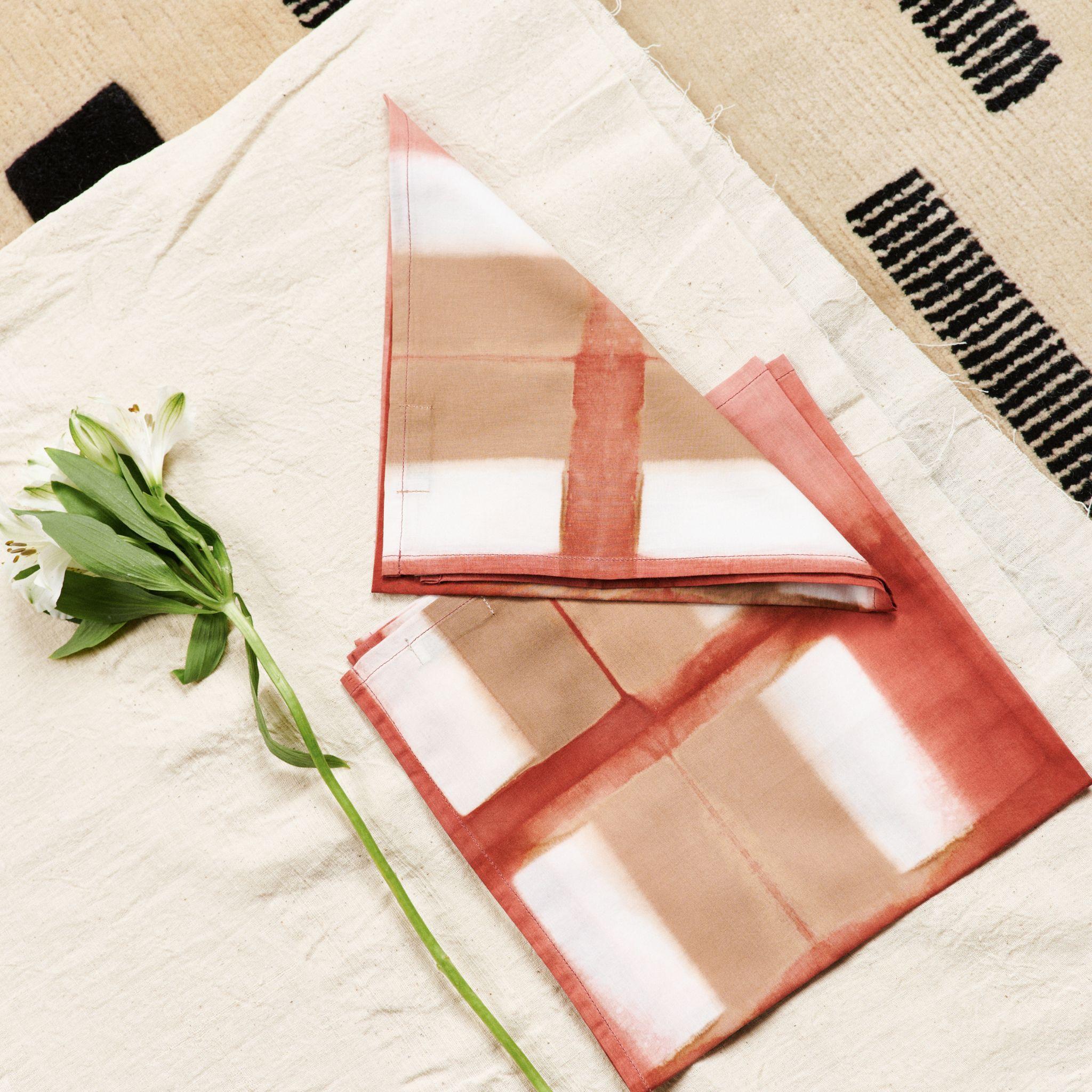Chowk table napkin is a unique modern artisanal napkin. Created artistically and ethically by artisans in India using clamp dye technique, using only pure natural dyes. It is a pure statement piece that adds modern and timeless quality as  a table