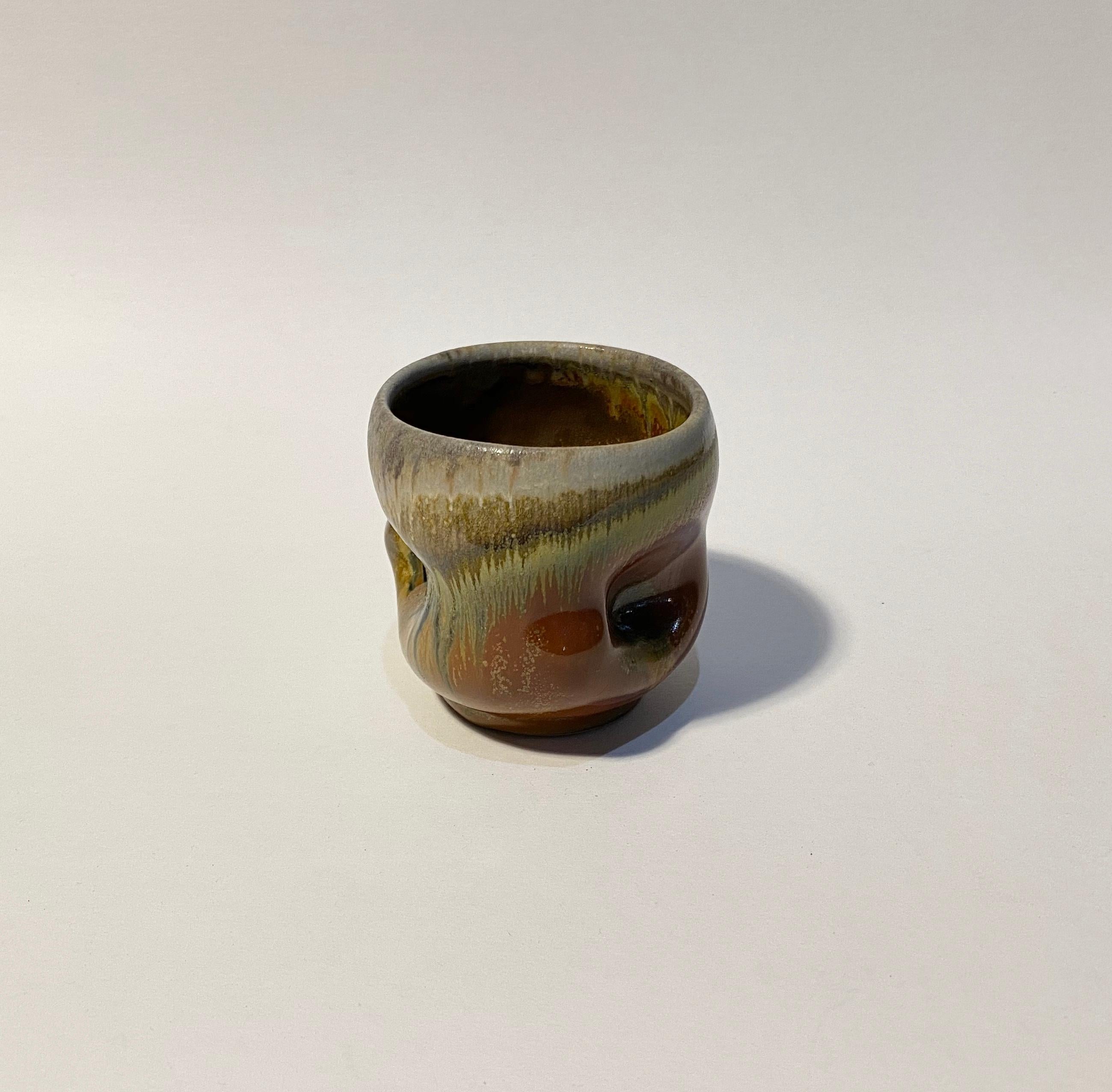 Chris Gustin, (born 1952)
Whiskey cup, 2019
Stoneware
Measures: 3.25 x 3.5 x 3.25
Anagama wood fired
Signed on the underside with the artist's device

Chris Gustin is a studio artist and Emeritus Professor at the University of Massachusetts,