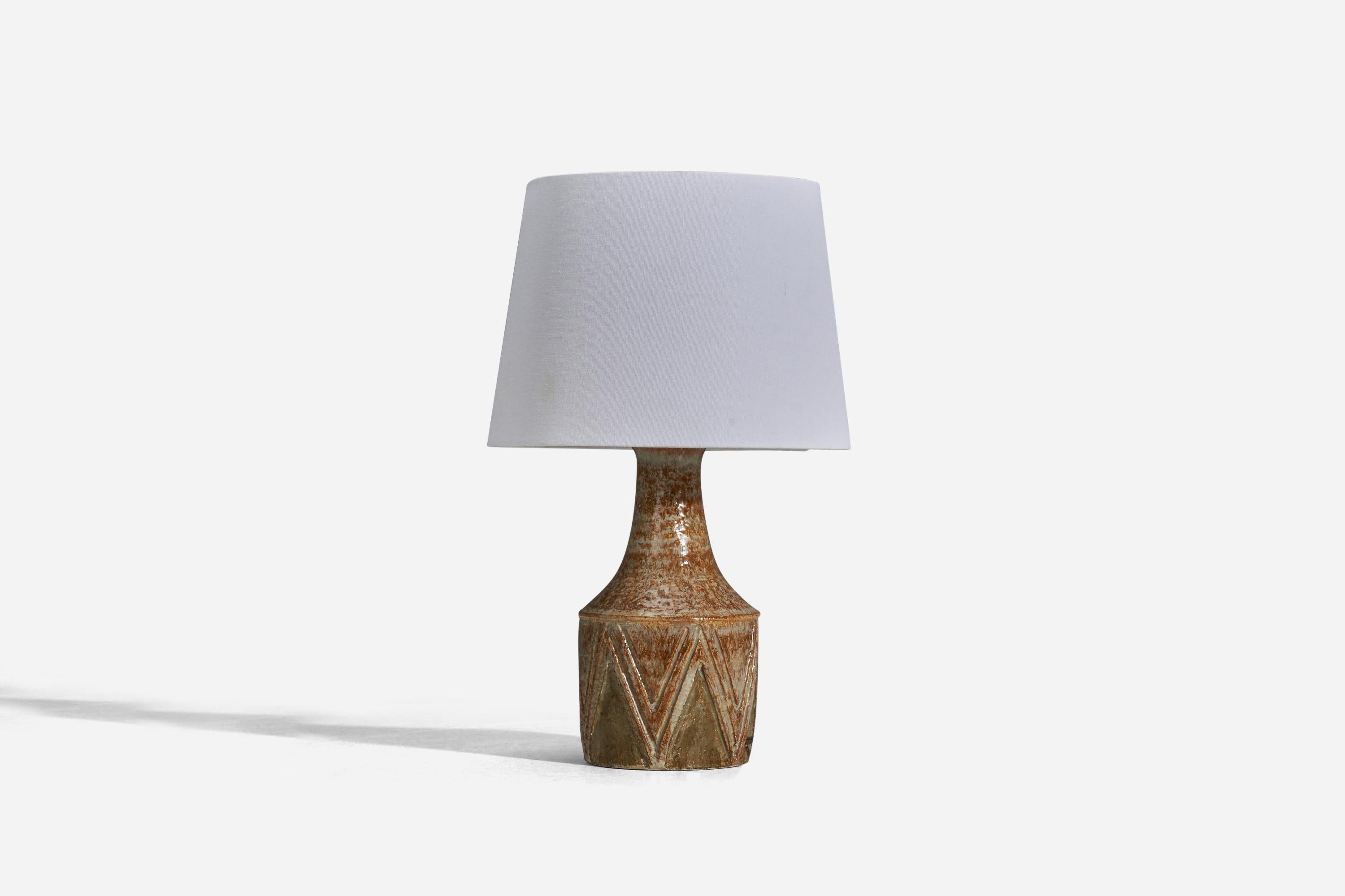 A brown glazed stoneware table lamp designed and produced by Chris Haslev Keramik, Denmark, 1960s. 

Sold without lampshade
Dimensions of lamp (inches) : 11.5 x 5.12 x 5.12 (height x width x depth)
Dimensions of lampshade (inches) : 8 x 10 x 7.5