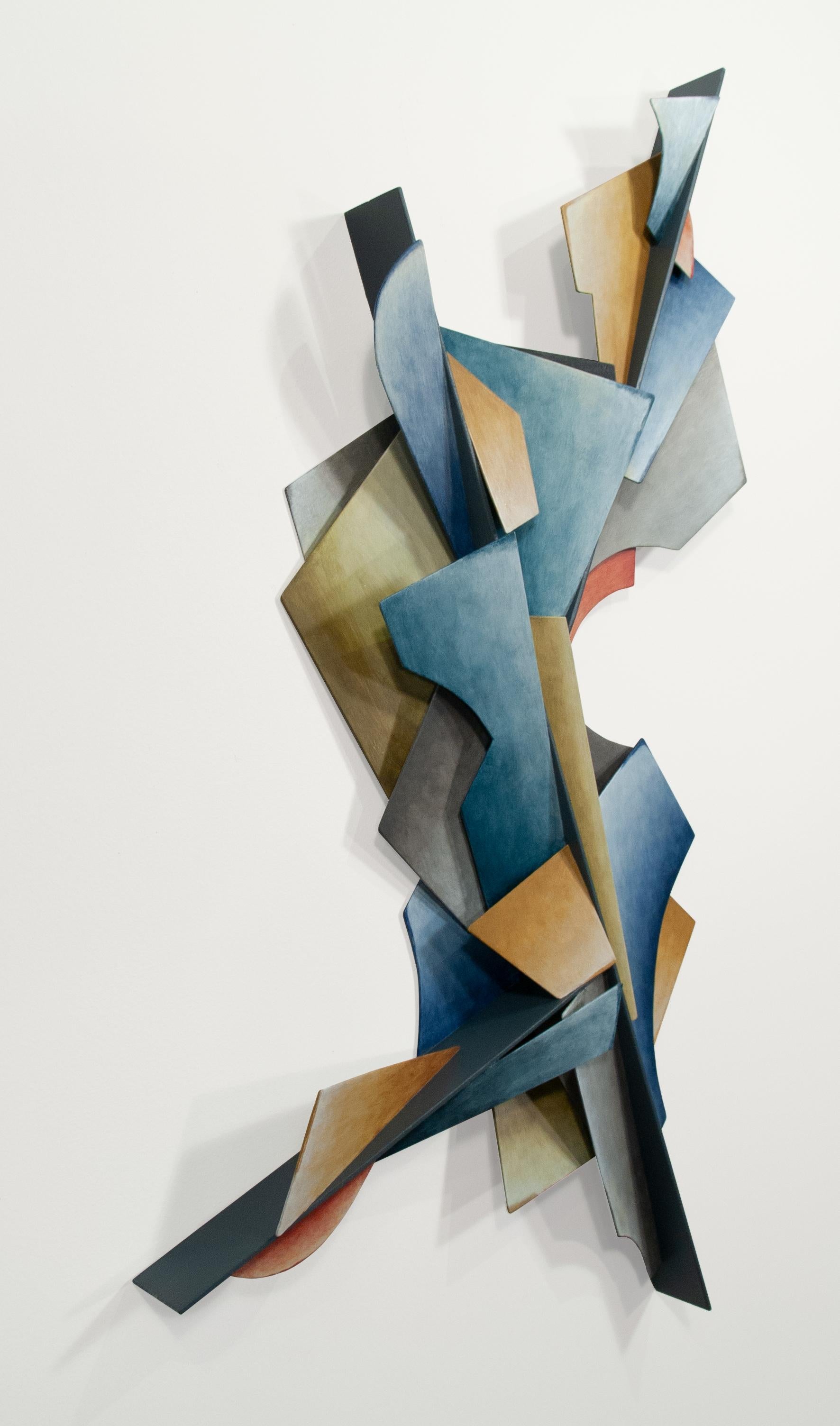 This dynamic wall sculpture is created from sheets of steel, welded together in an abstract geometric pattern.  Muted shades of blue, grey, purple and green dominate and are balanced by softer hues. While the work adheres to a rigid, rational
