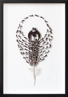"Delizia degli anfibi", scultura di piume intagliate a mano
