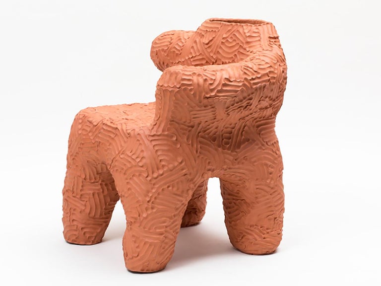 Chair and planter handmade of solid terracotta by New York and Medellín-based artist Chris Wolston, titled the 