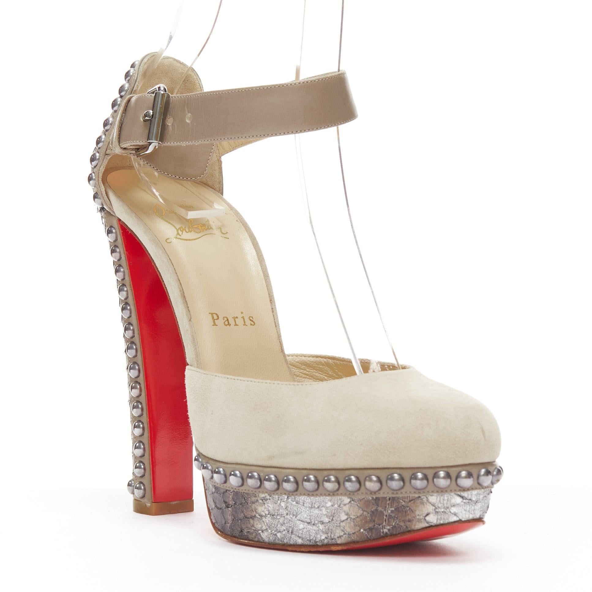 CHRISITAN LOUBOUTIN Luxura 140 grey suede studded scaled platform heel EU37
Reference: NKLL/A00105
Brand: Christian Louboutin
Model: Luxura 140
Material: Suede, Leather
Color: Grey, Silver
Pattern: Animal Print
Closure: Ankle Strap
Lining: Brown