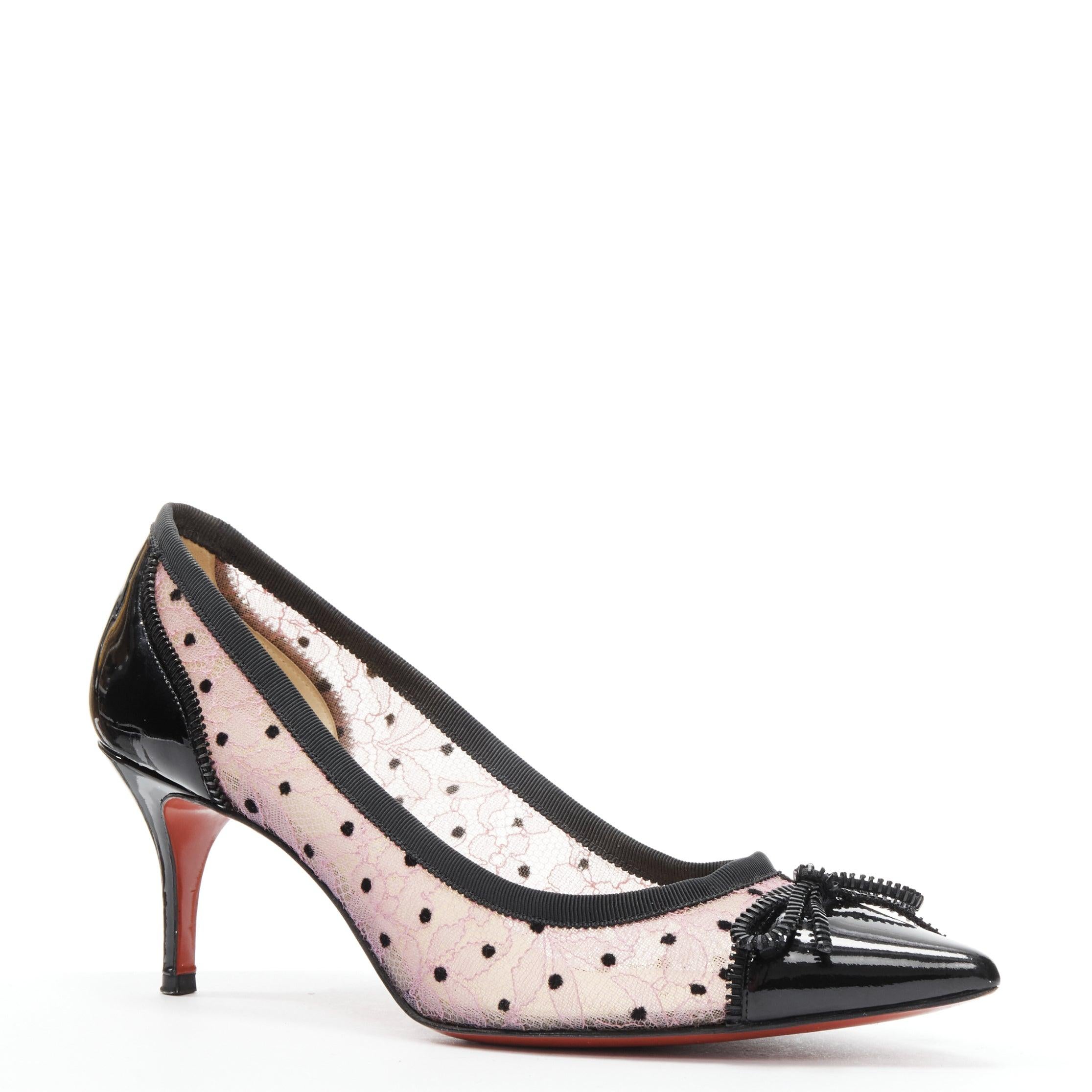 CHRISITIAN LOUBOUTIN Souris 70 pink lace polka dot bow kitten heel EU37.5
Reference: TGAS/B01859
Brand: Christian Louboutin
Model: Souris 70
Material: Patent Leather, Lace
Color: Pink, Black
Pattern: Floral
Lining:  Leather
Extra Details: Pink lace