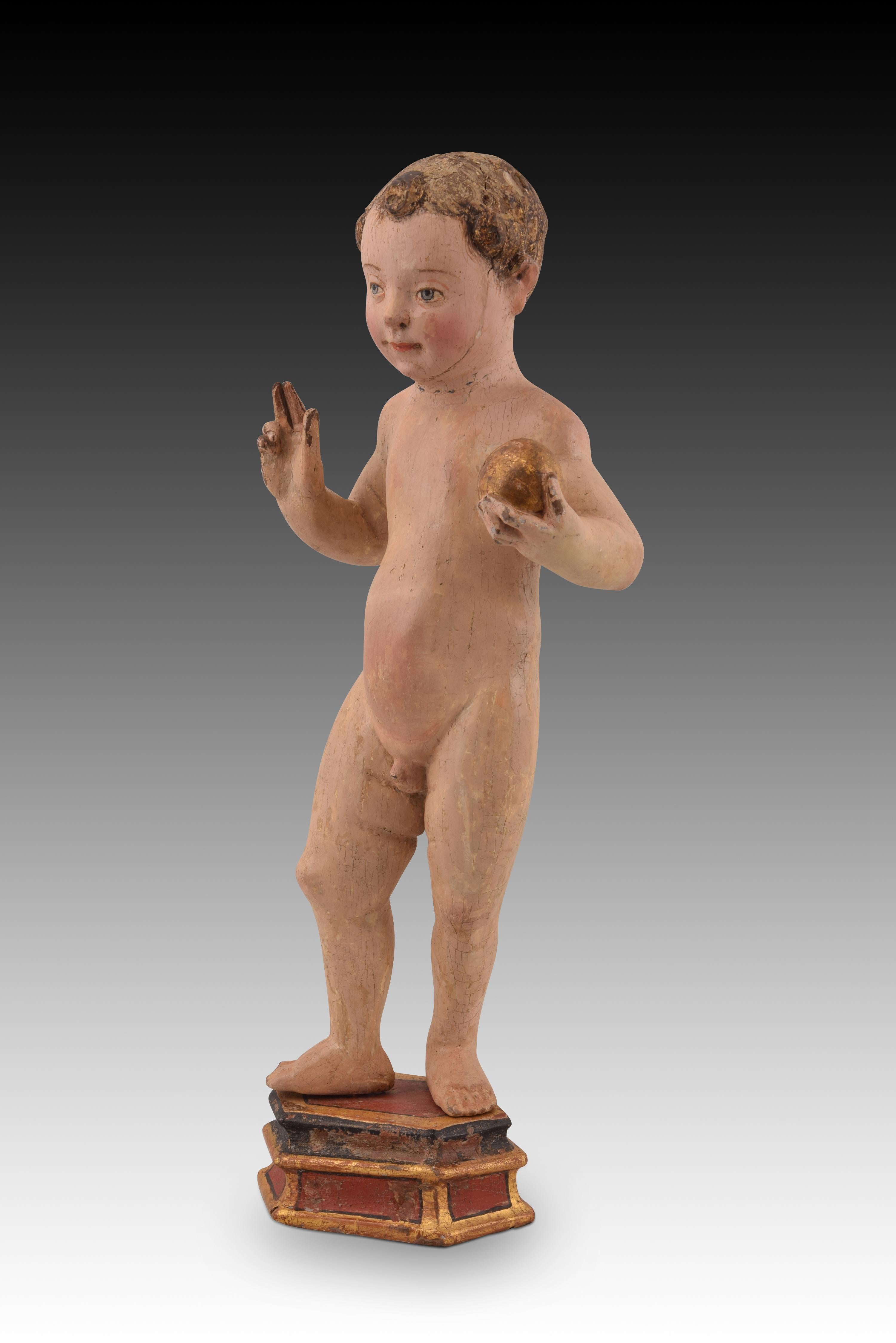 Baby Jesus on pedestal. Polychrome wood. Flemish school, 16th century, with restorations. 
Carved and polychrome wooden Child Jesus standing on a pedestal of the same material, standing, advancing, with his right hand blessing and an orb in his