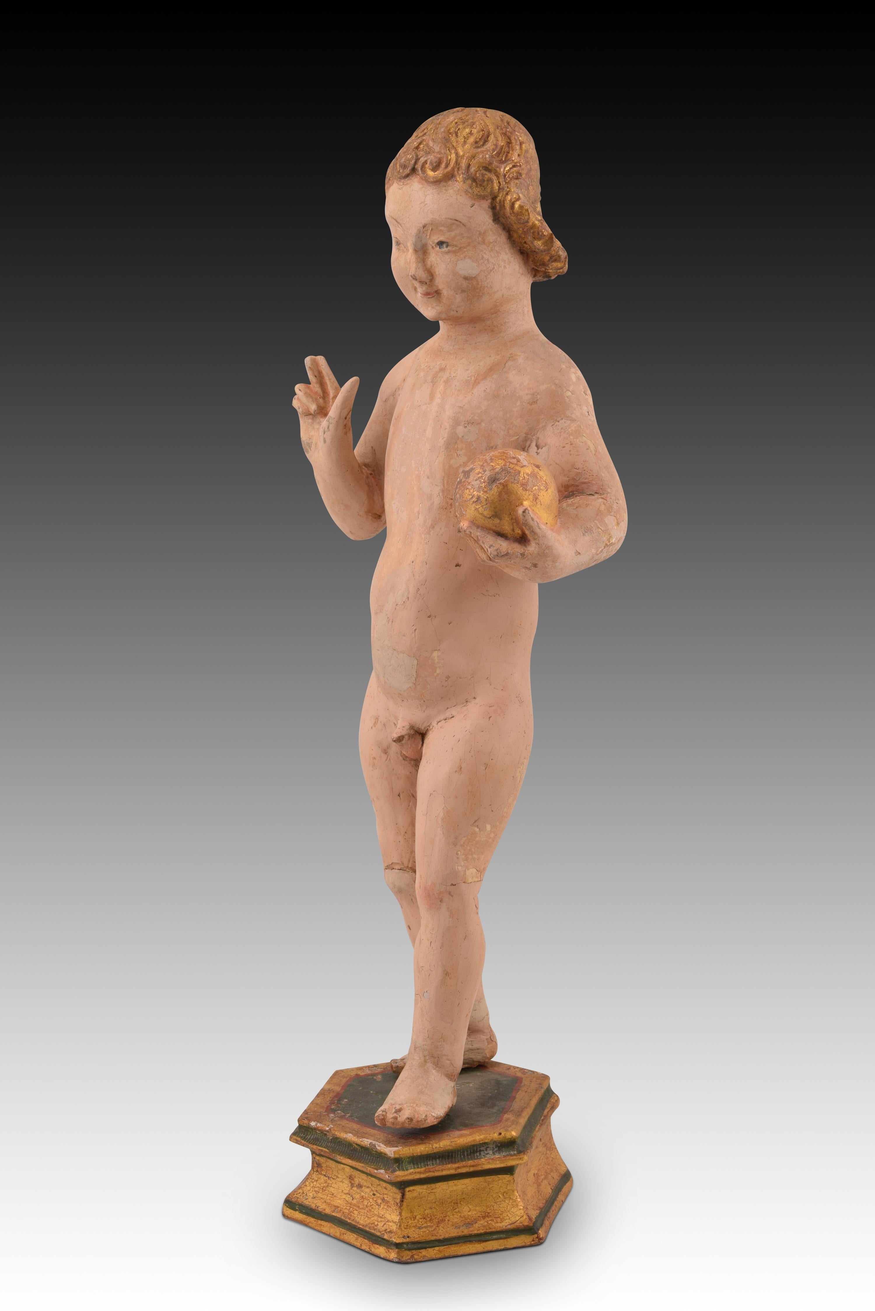 Enfant Jésus sur un piédestal. Bois polychrome. Malines, XVIe siècle, avec restaurations. 
Enfant Jésus en bois sculpté et polychrome, debout sur un piédestal de même matière, debout, avançant, la main droite bénissant et un orbe dans la gauche.