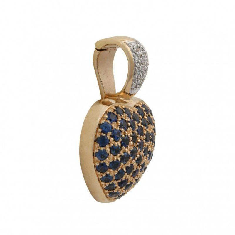saphire im Facettenschliff insgesamt ca. 1,6 ct, 11 Brillanten insgesamt ca. 0,11 ct, gute Farbe und Reinheit, L: ca. 3 cm, GG/WG 14K, 11,6 g, Ende 20. Jahrhundert, minimale Gebrauchsspuren.

 CHRIST 'Heart' Anhänger/Clip mit fac. Saphiren insg. ca.