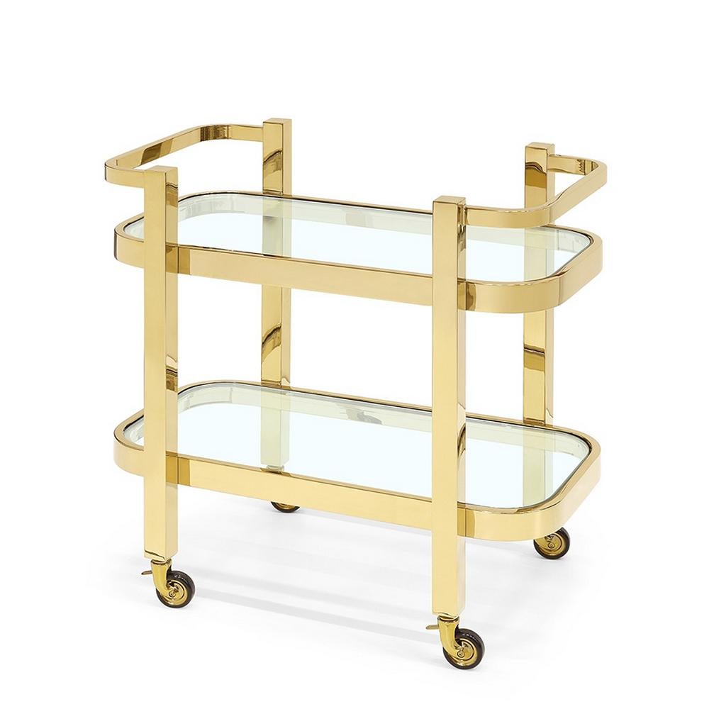 Trollet Christensen with metal structure in gold
finish and with 2 clear glass tops. On wheels.
Also available in chrome finish with 2 black tempered
glass tops.