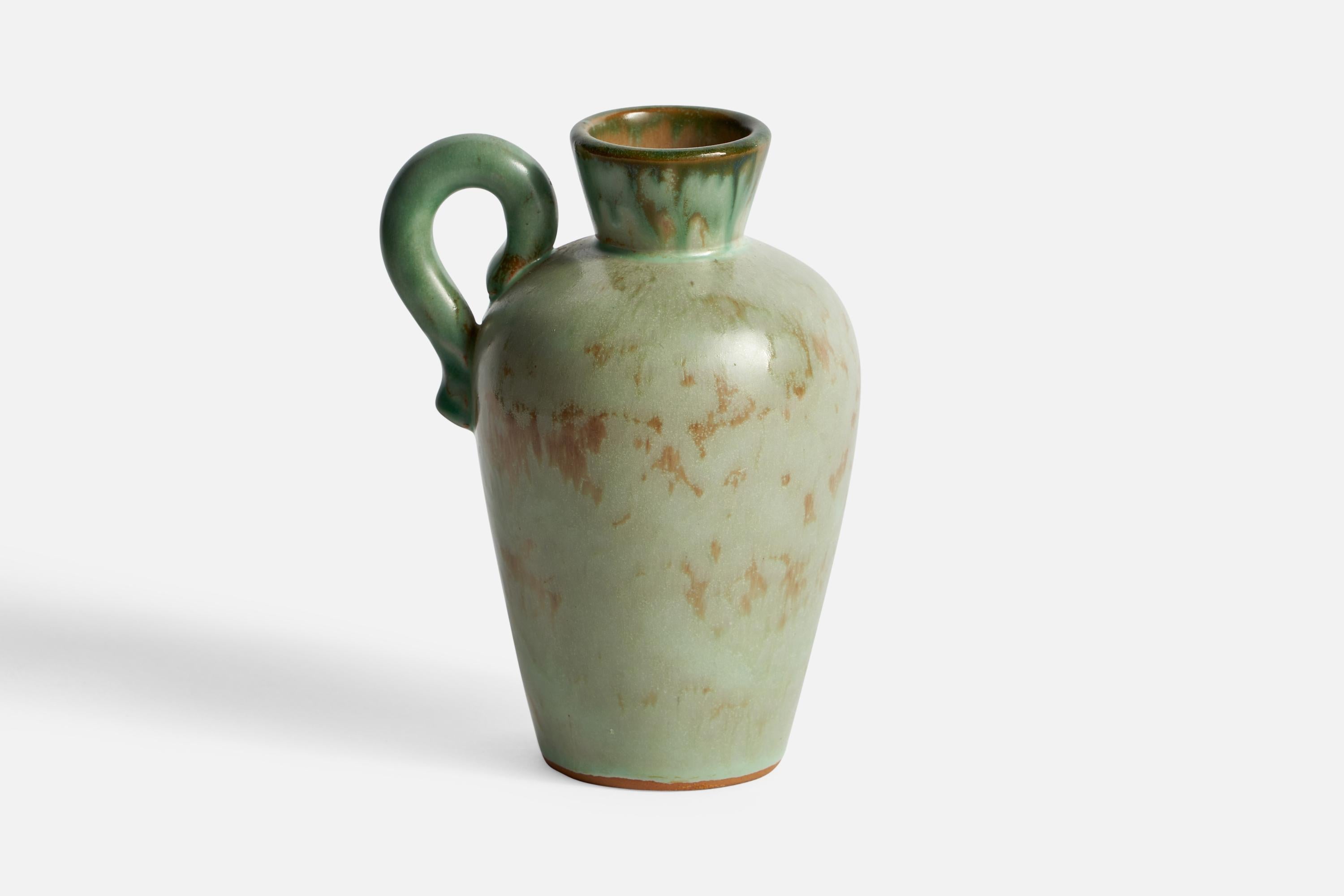 A green-glazed earthenware vase designed by Christer Heijl and produced by Töreboda Keramik, Sweden, 1930s.