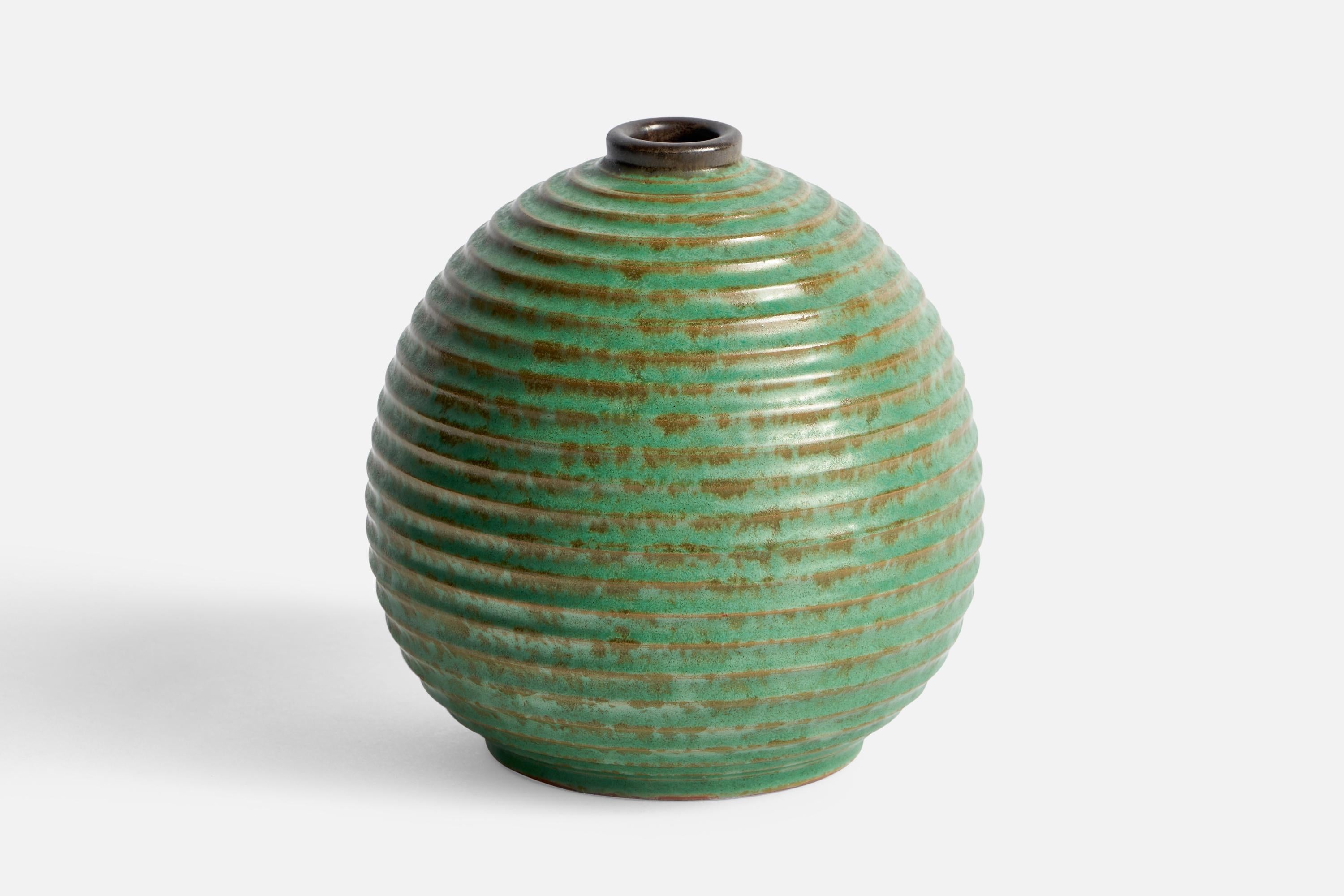 A green-glazed ceramic vase designed by Christer Heijl and produced by Töreboda Keramik, Sweden, 1930s.