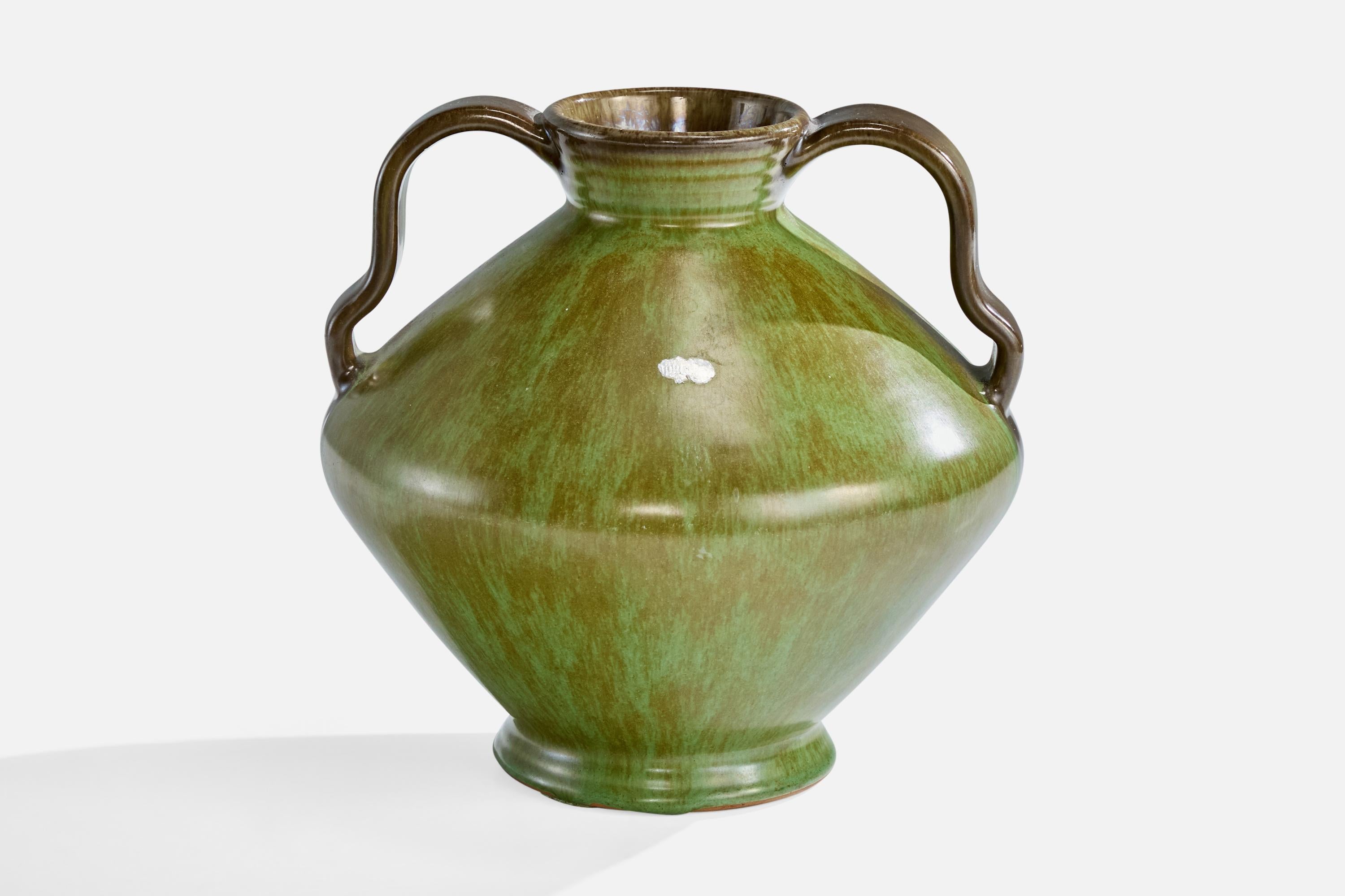 A green-glazed ceramic vase designed by Christer Heijl, Sweden, c. 1930s.

Wear consistent with age and use

Overall Dimensions (inches): 6.75