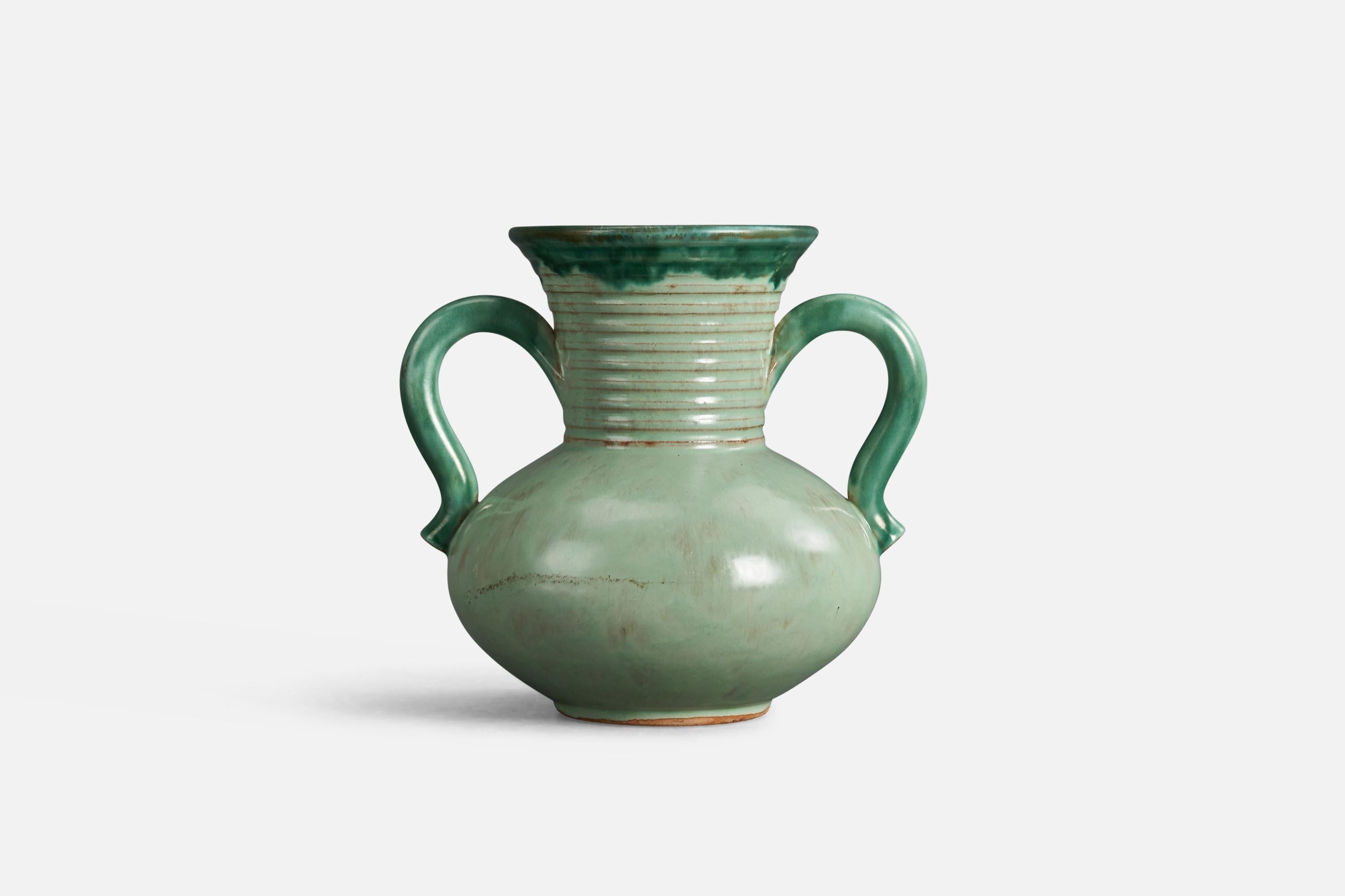 A brass vase designed by a Christer Heijl and produced by Töreboda, Sweden, 1940s.