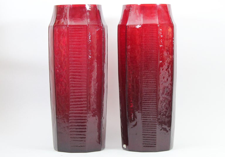 Christer Sjögren (1926-2008) for Lindshammar, Sweden. 
A pair of decagon shaped ruby red tall glass vases, the 1960s.

A stunning and very unusual pair of striking ruby red glass decagon shaped vases.
Designed by Christer Sjögren for Lindshammar