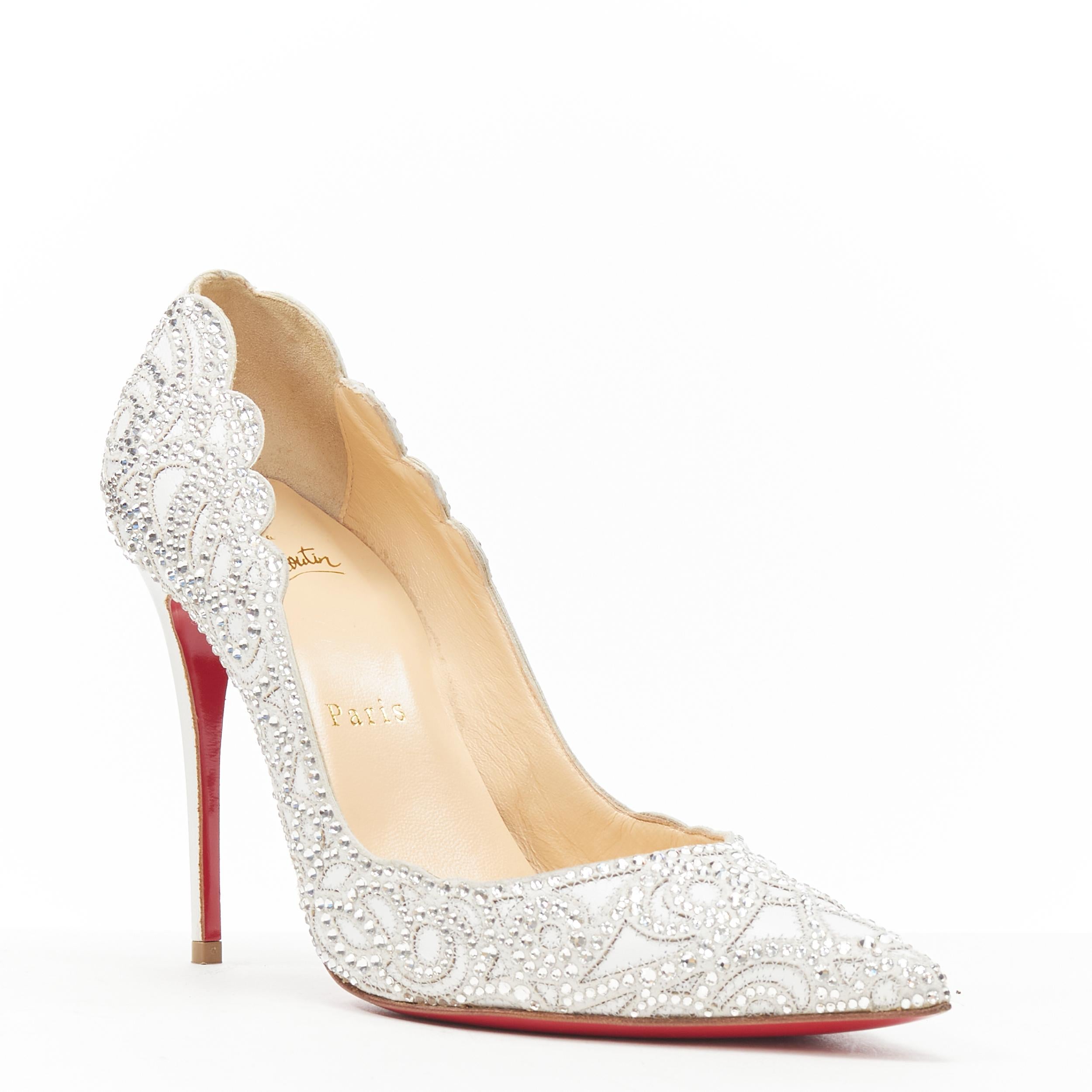 CHRISTIA LOUBOUTIN Top Vogue white strass crystal bridal pump EU37 
Reference: TGAS/B01137 
Brand: Christian Louboutin 
Designer: Christian Louboutin 
Model: Top Vague strass pump 
Material: Leather 
Color: White 
Pattern: Solid 
Extra Detail: Top