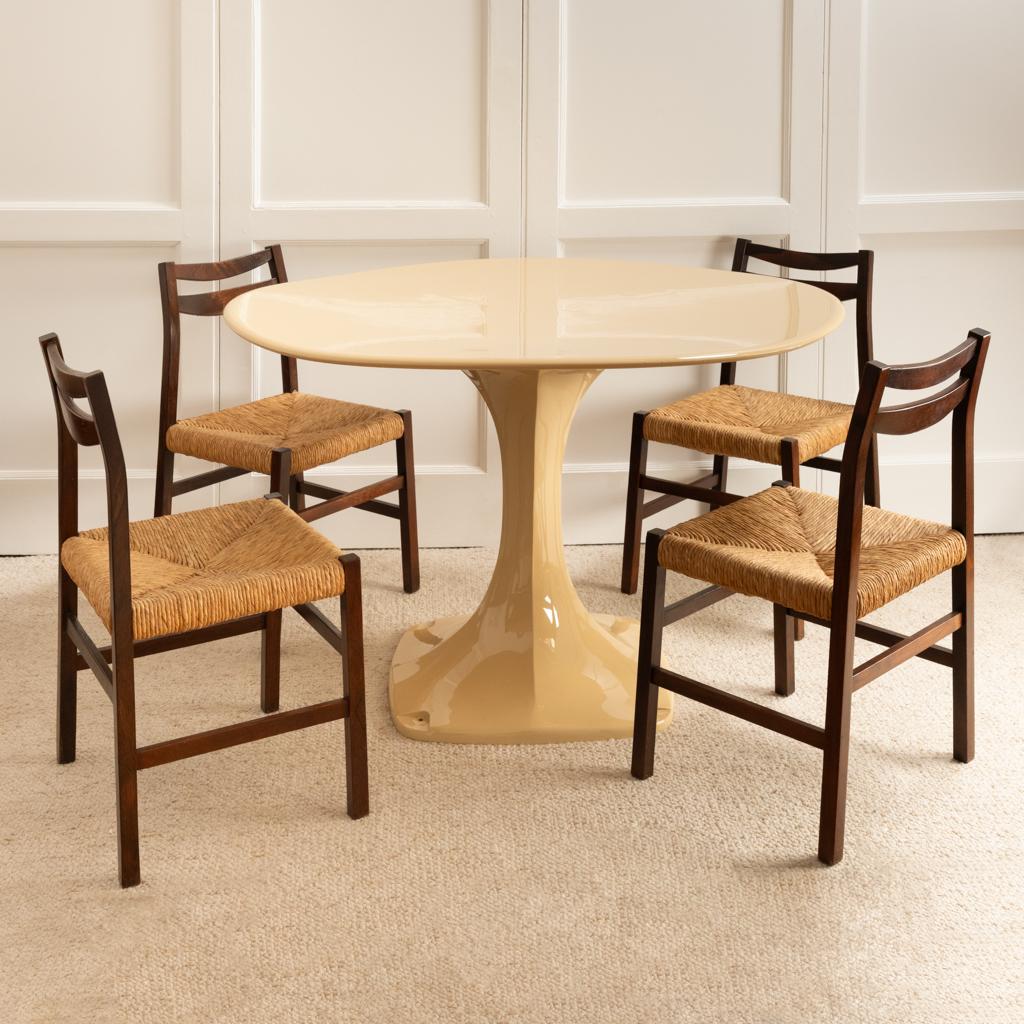 Christian Adam, Formes Nouvelles edition.

Naila dining table with a single-piece lacquered fiberglass frame.
Italian work, circa 1971.
The top is free-form, like a flower petal.
The leg and top are separate and rest only on top of each other.
Fully