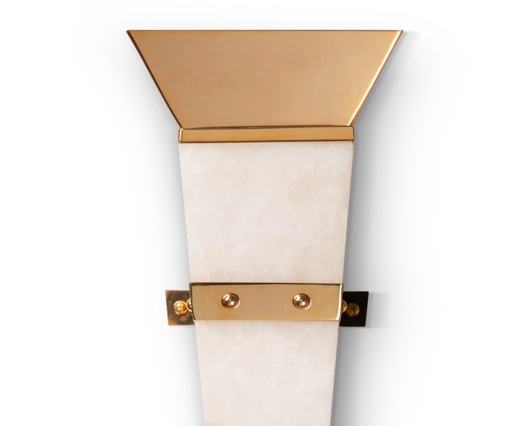 Alabaster, brass and gilded gold wall lamp designed and produced by Christian Caudron, Meilleur Ouvrier de France 2015*, in his Parisian workshop.

This sconce, part of the Bridge Collection, is inspired by the arches of the bridges of