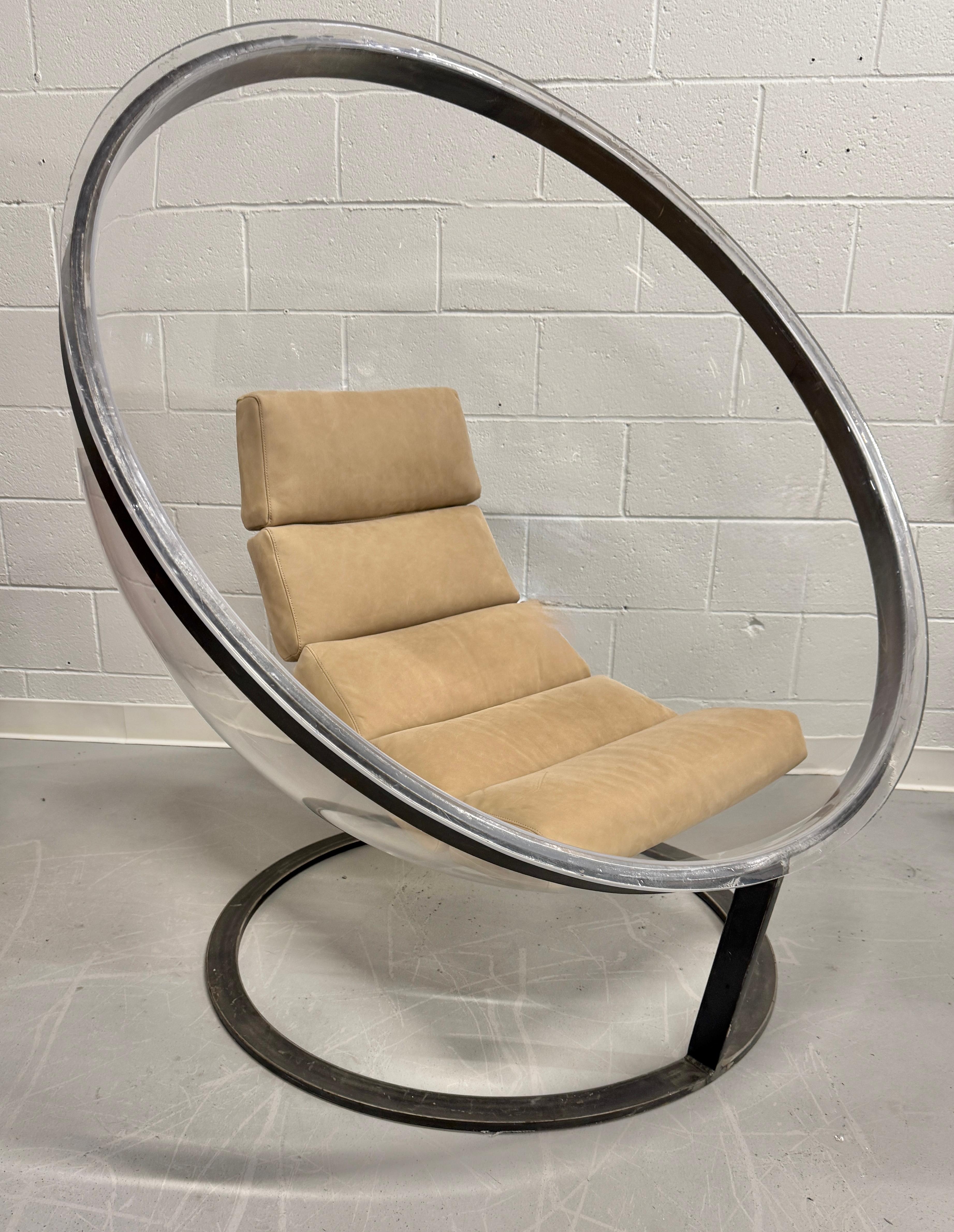 A fabulous sphere or bubble chair by Christian Daninos for Laroche of France. The chair was produced in the late 1960’s. We’ve had the lucite completely polished.  The lucite is now clear and clean. There are still a few marks to the rim from