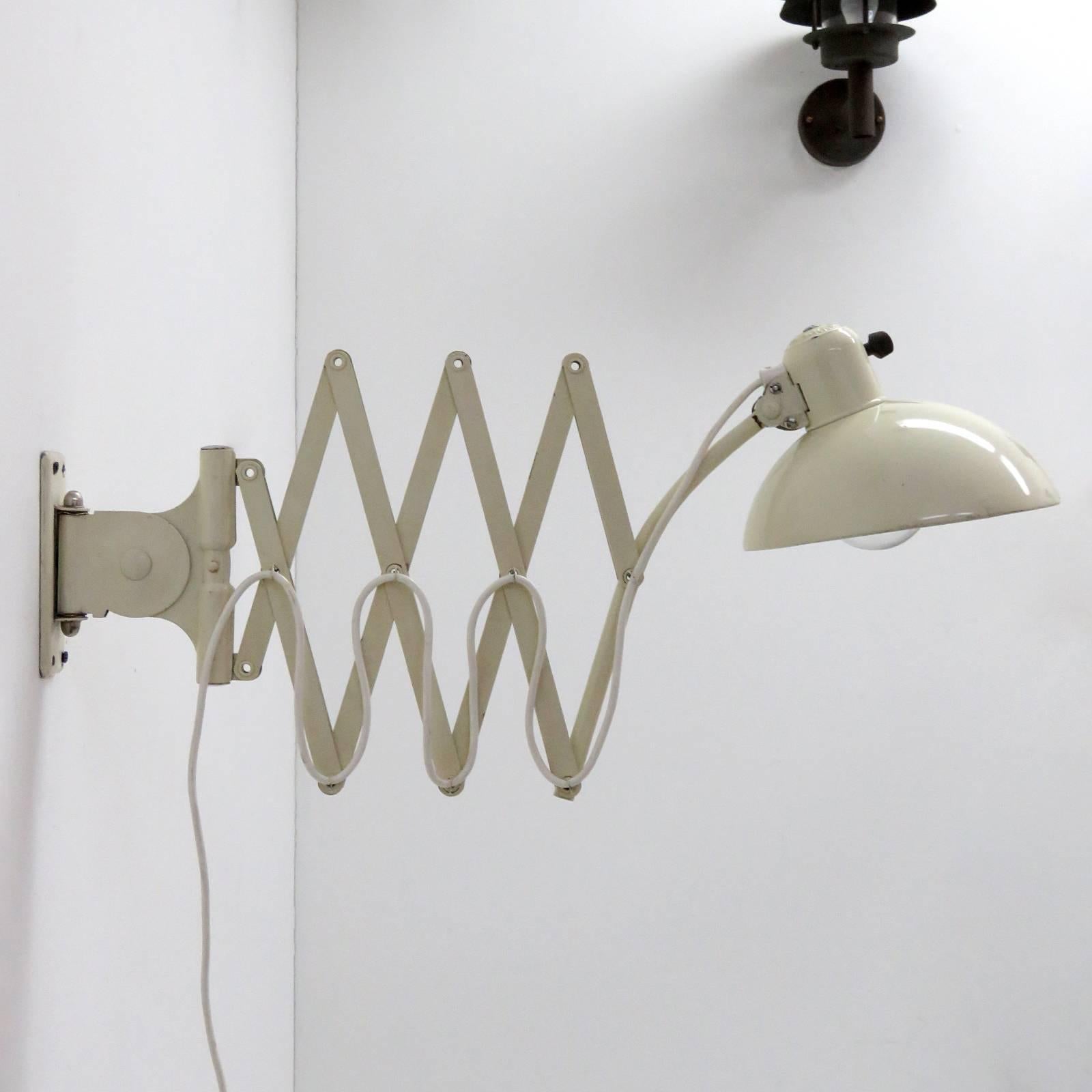 Large wall scissors lamp by Christian Dell for Kaiser Idell, 1933, off-white model No. 6614, maximum cantilever, 49