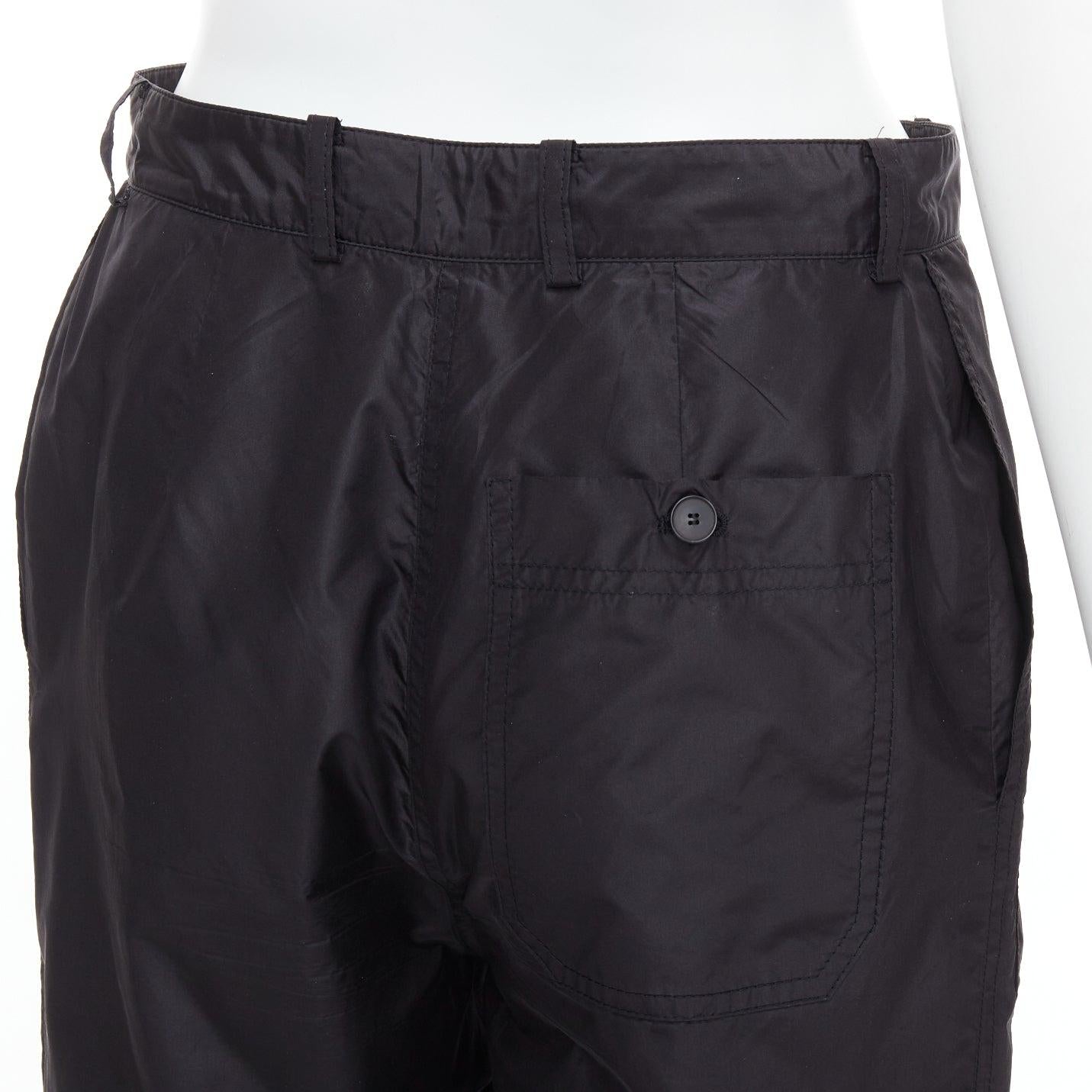 CHRISTIAN DIOR 100% silk black button fly wide cargo pants FR36 S
Reference: NKLL/A00414
Brand: Dior
Designer: Maria Grazia Chiuri
Material: 100% Silk
Color: Black
Pattern: Solid
Closure: Button Fly
Extra Details: Single back pocket.
Made in: