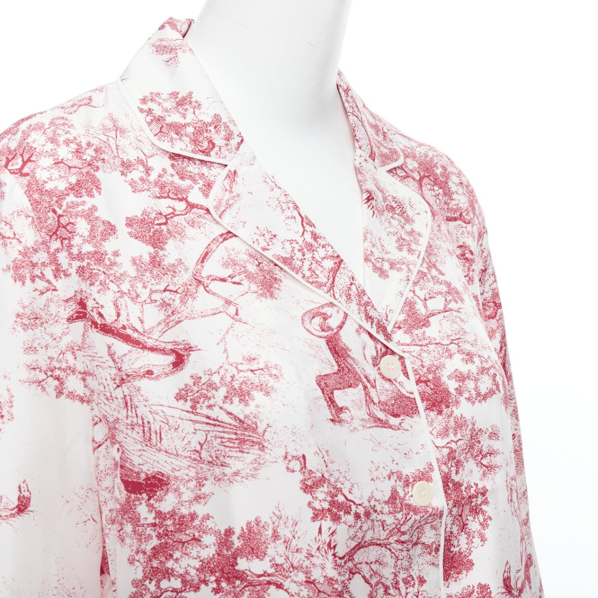 CHRISTIAN DIOR 100% silk red Toile De Jouy animal print pajama shirt FR40 L
Reference: AEMA/A00110
Brand: Dior
Designer: Maria Grazia Chiuri
Collection: Toile De Jouy
Material: Silk
Color: Red, White
Pattern: Floral
Closure: Button
Made in: