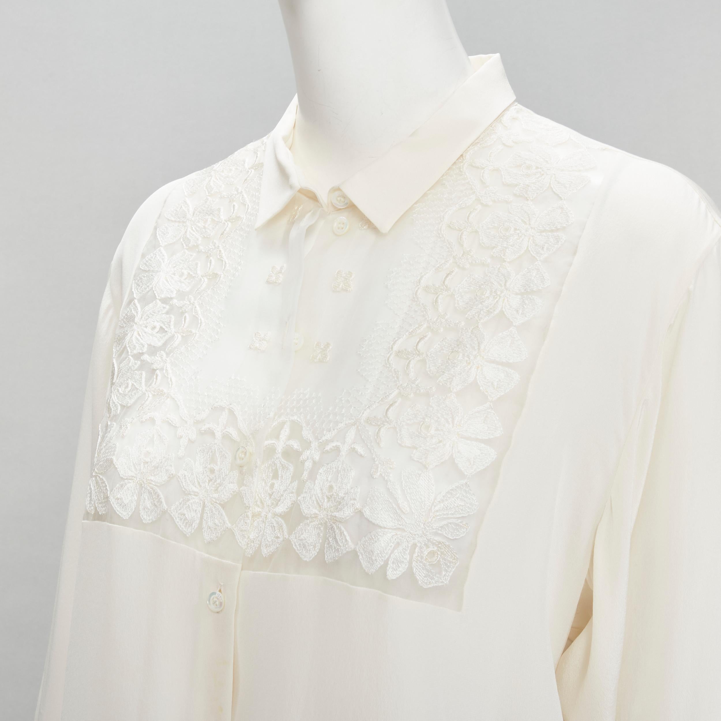 CHRISTIAN DIOR 100% silk sheer floral embroidery long sleeve shirt FR44 XL
Brand: Christian Dior
Material: 100% Silk
Color: Beige
Pattern: Solid
Closure: Button
Extra Detail: Sheer embroidery panel bib collar.
Made in: Italy

CONDITION:
Condition:
