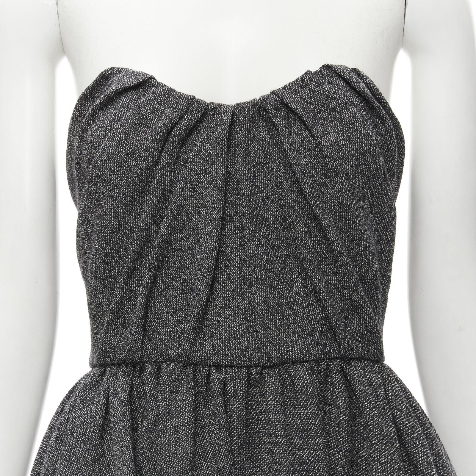 CHRISTIAN DIOR 100% virgin wool grey sweetheart bustier midi gown FR34 XS
Reference: AAWC/A00067
Brand: Christian Dior
Designer: Maria Grazia Chiuri
Material: Virgin Wool
Color: Grey
Pattern: Solid
Closure: Zip
Lining: Silk
Extra Details: Boned