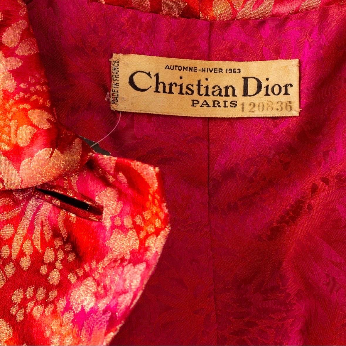 Christian Dior 1963 Red and Gold Brocade Fur Trim Opera Coat

Fall 1963 Collection by Marc Bohan
Red/Pink/Gold Lurex/Metallic
Floral brocade motif
Pointed collar
Fur trim cuffs
Fabric covered buttons
Front flap pockets
Front button closure
Back vent