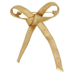 Christian Dior 1965 Vintage Long Knot Bow Ribbon Star Relief Mesh Gold Brooch