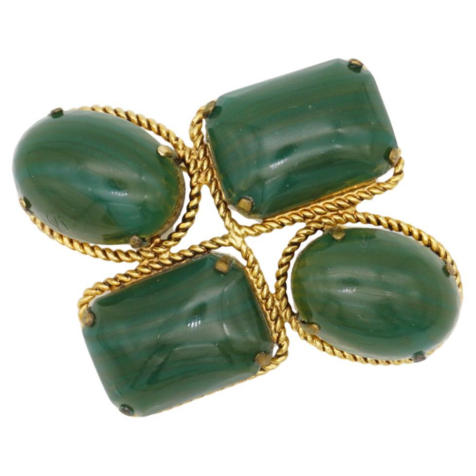 Christian Dior 1966 Vintage 4 Four Dark Green Emerald Oval Rectangle Brooch, Gold Tone

Very good condition. Light scratches or colour loss, barely noticeable, date back to 1966, over almost 60 years.

Signed at the rear. Rare to find. 100%